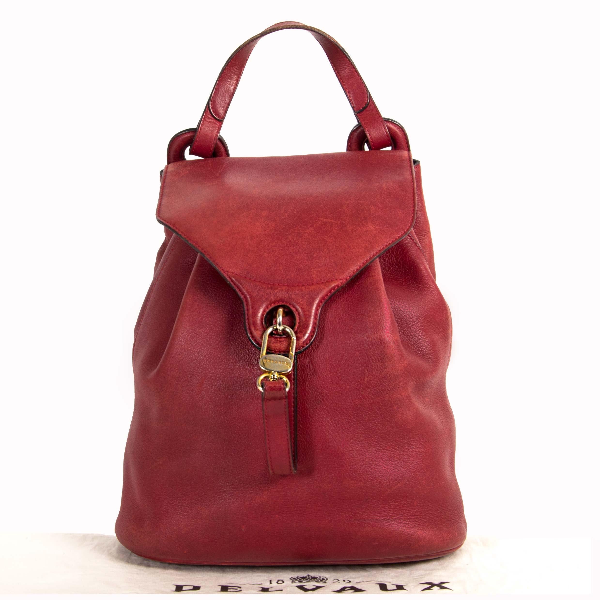 Good preloved condition

Delvaux Red Rose PM Backpack

A backpack is what you need when you are looking for a practical accessory. This Delvaux backpack features red leather and gold toned hardware. 
The bag opens at the back with a zipper. The