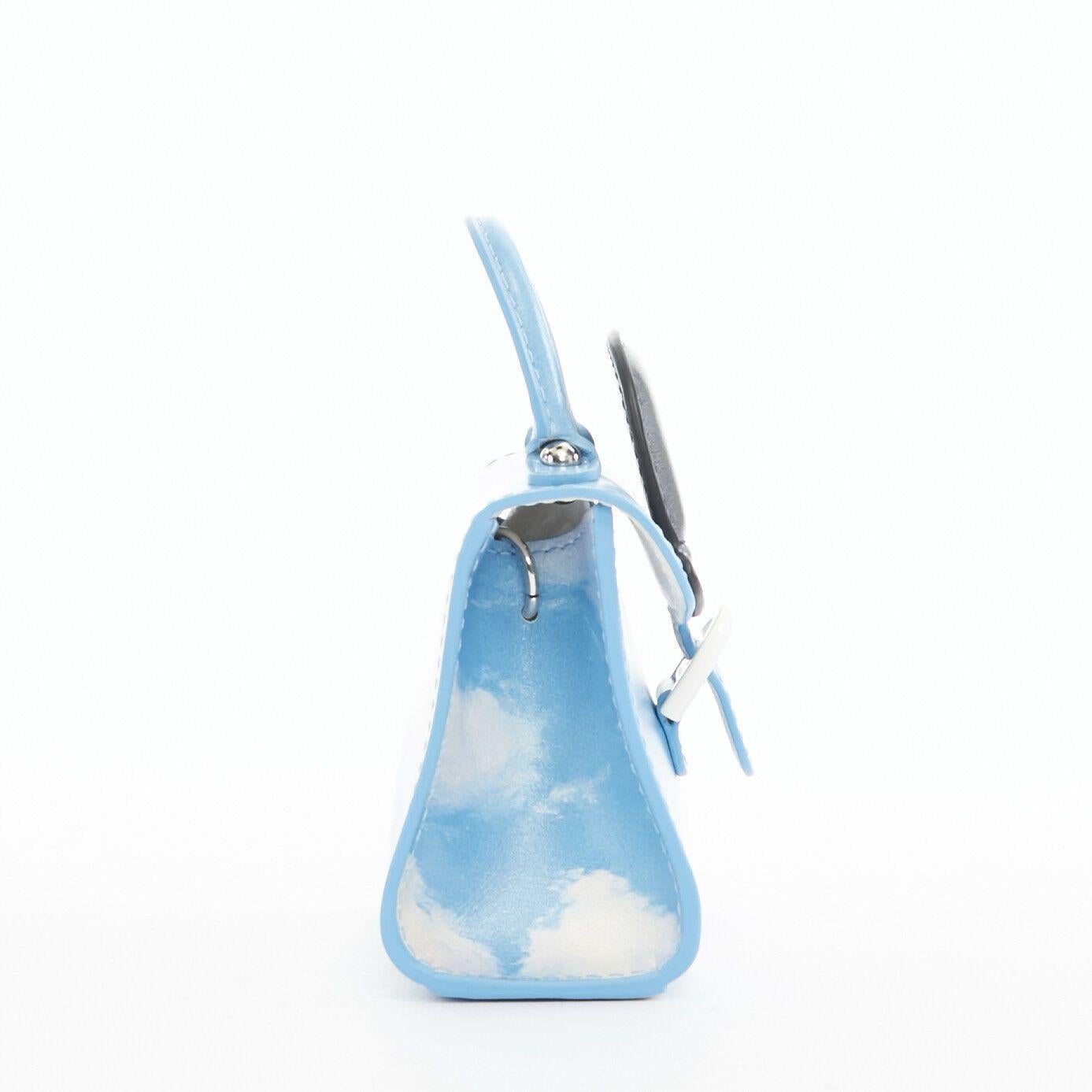 Blue DELVAUX Rene Magritte Miniatures Belgitude bowler hat cloud print mini bag charm