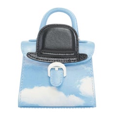 Used DELVAUX Rene Magritte Miniatures Belgitude bowler hat cloud print mini bag charm