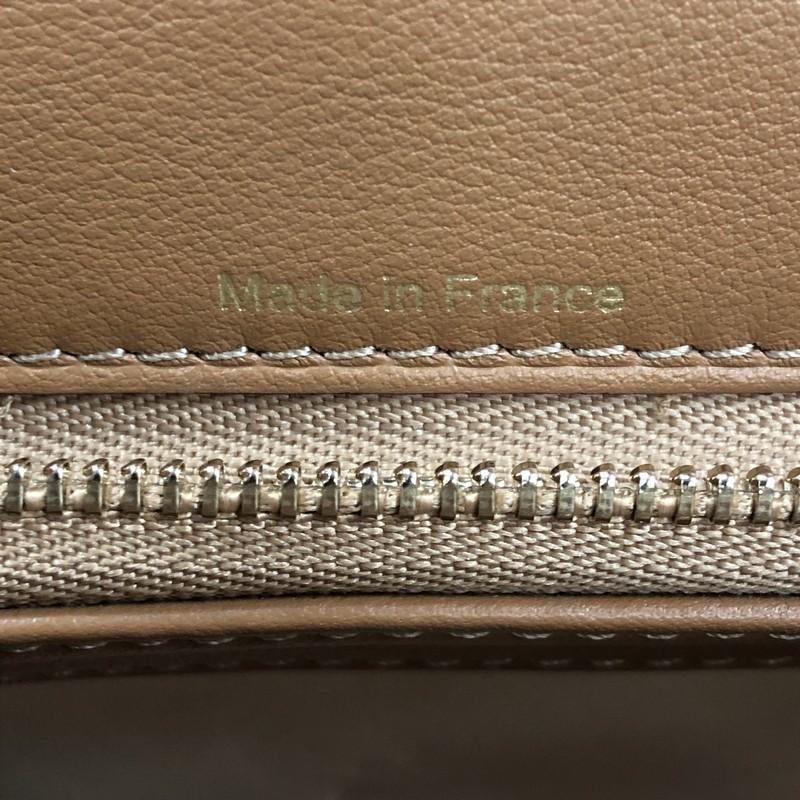 Delvaux Tempete Top Handle Bag Leather MM, crafted from brown leather In Excellent Condition In NY, NY