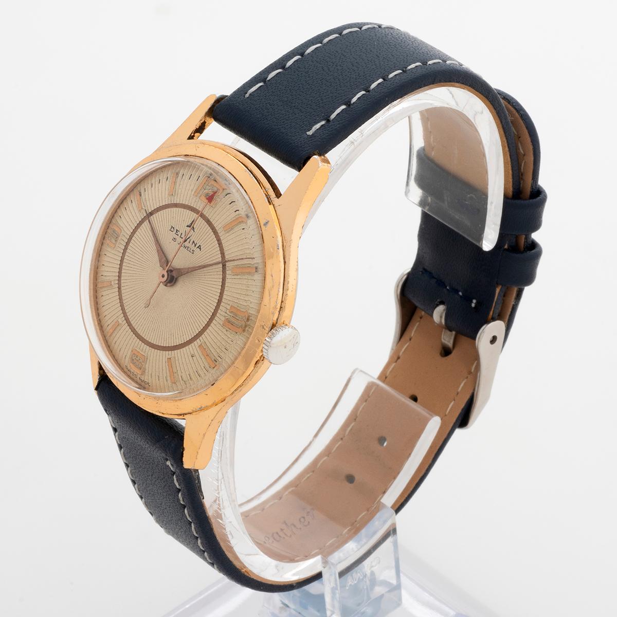 da uomo o donna Orologio da polso Delvina Geneve placcato oro, movimento 15 Jewell, con scatola, 1964 circa. in vendita