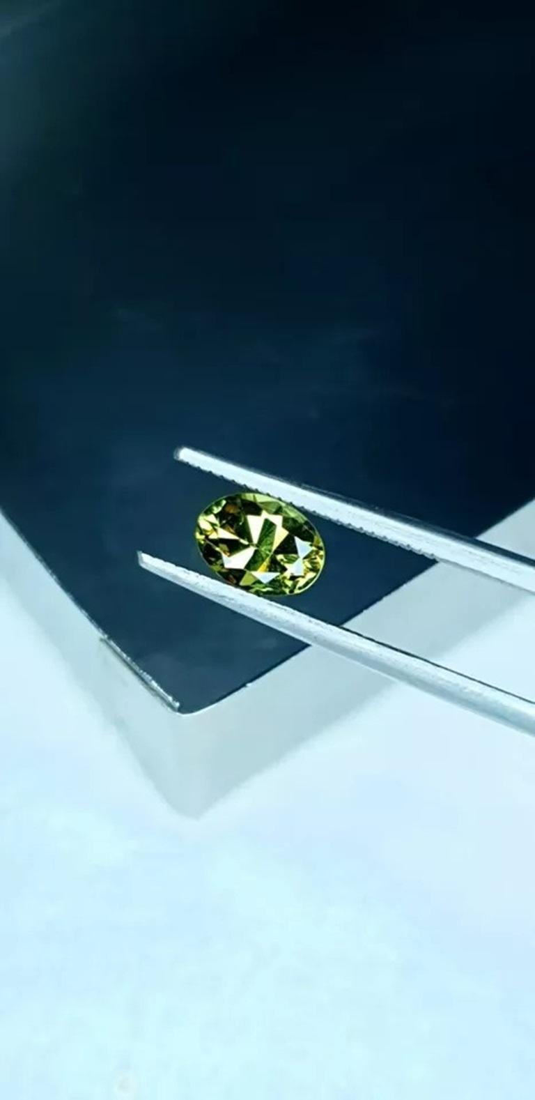 Oval Cut Demantoid Garnet Cut Stone 0.90Cts Natural Madagascar For Sale