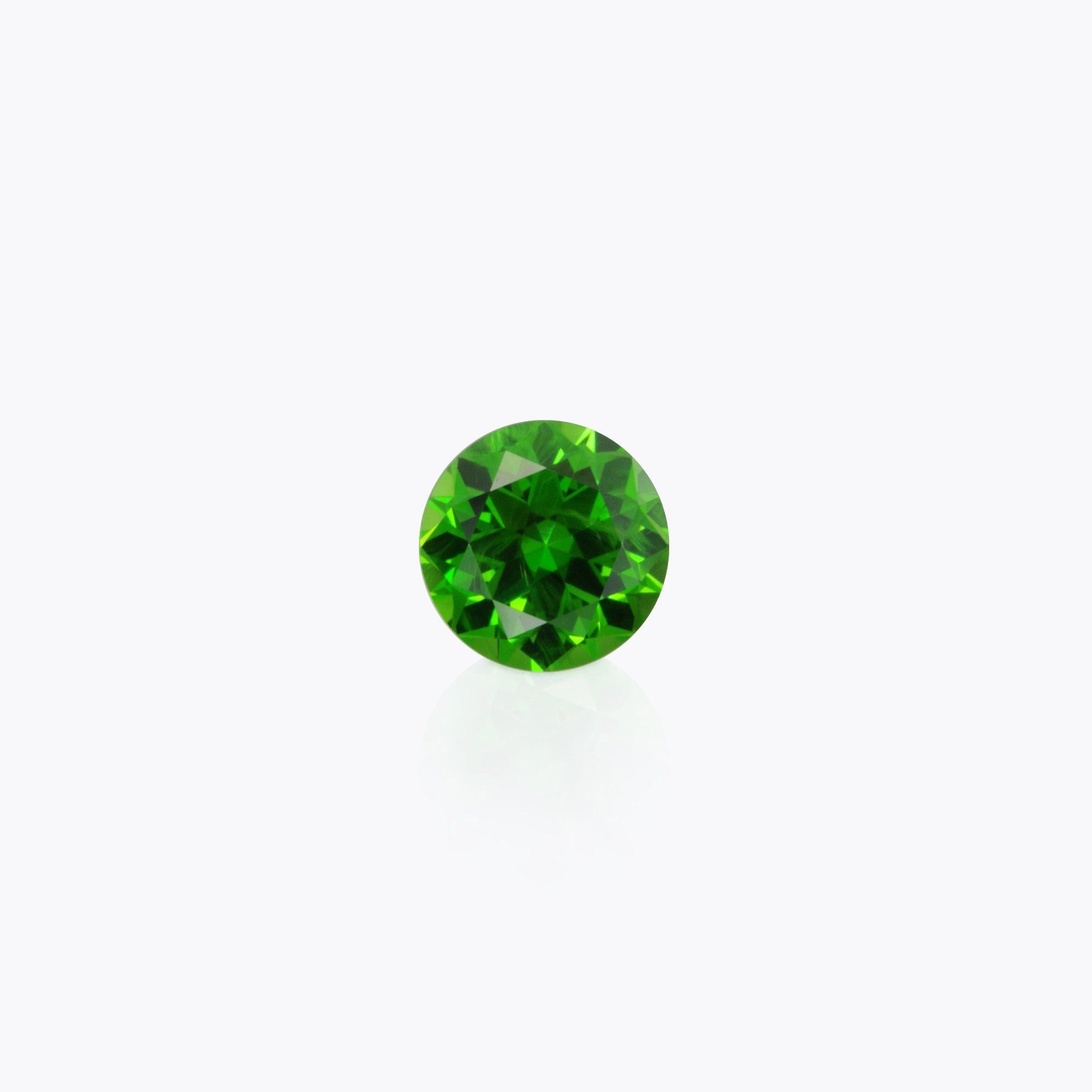 Superb 0.86 carat Russian Demantoid Garnet round gem, offered loose to sophisticated gem collector.
Returns are accepted and paid by us within 7 days of delivery.
We offer supreme custom jewelry work upon request. Please contact us for more