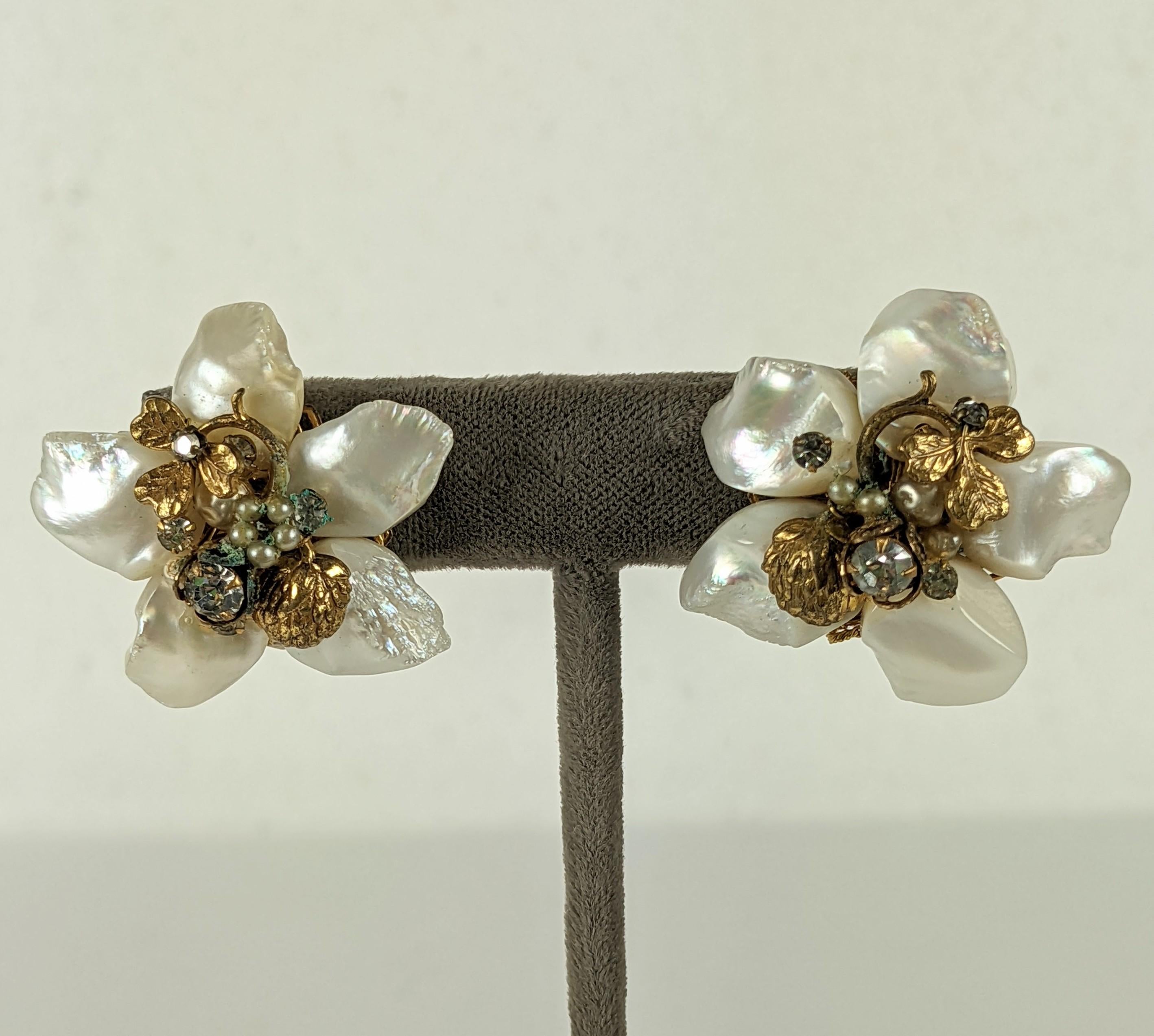 DeMario Pearl Petal Flower Earrings from the 1940's USA. Mother of pearl petals are used for the flowerhead with gilt clovers and buds with mini pearls decoration. 
Clip back fittings. 1 3/8