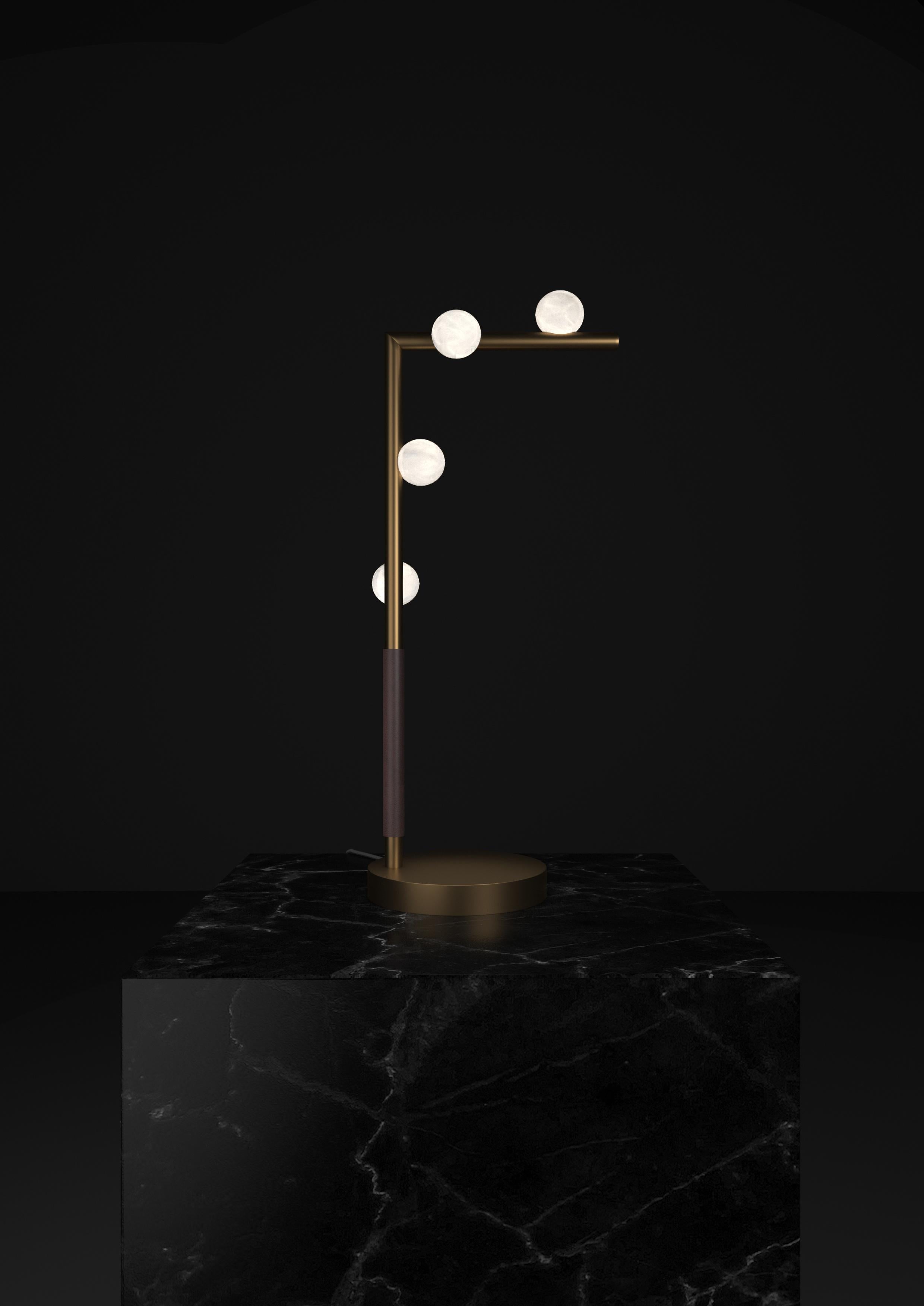 Demetra Bronze Table Lamp by Alabastro Italiano
Dimensions: D 20 x W 35 x H 67 cm.
Materials: White alabaster, bronze and leather.

Available in different finishes: Shiny Silver, Bronze, Brushed Brass, Ruggine of Florence, Brushed Burnished, Shiny