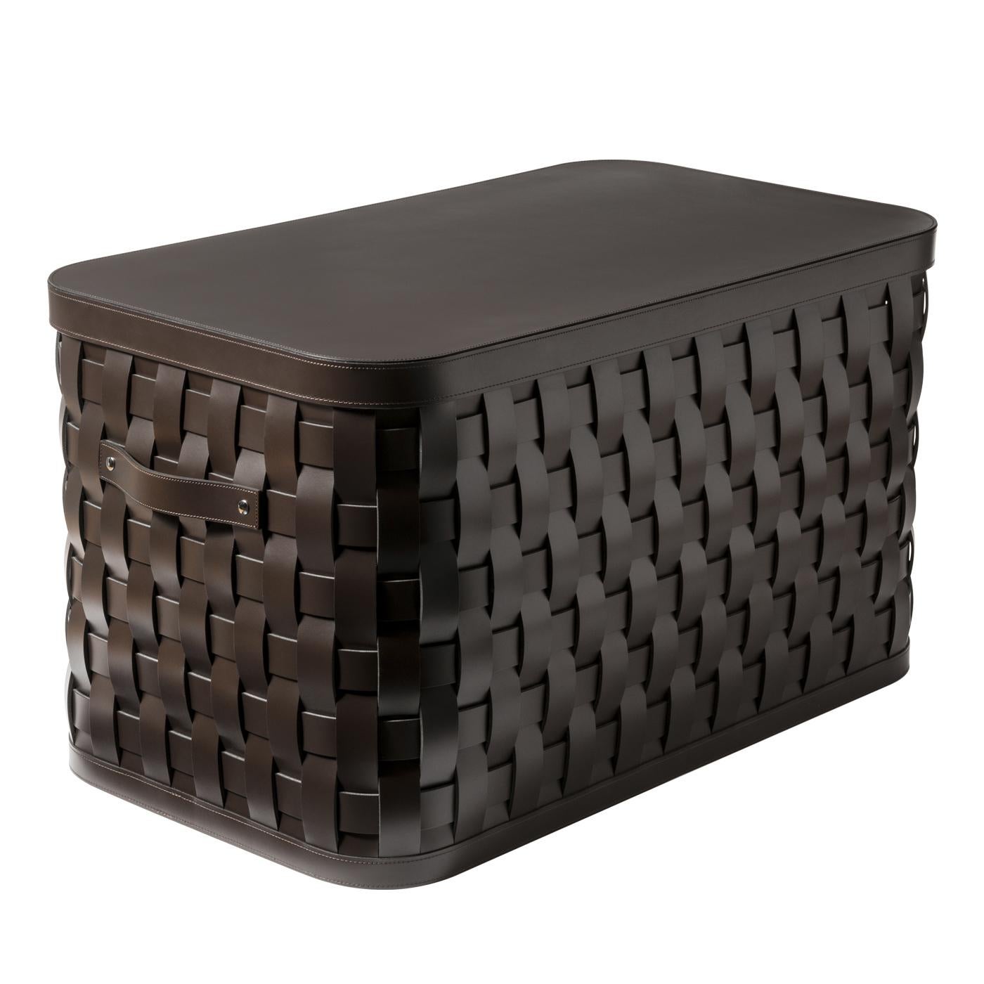 Part of the Demetra series, this tall basket is made of high quality, durable, eco-friendly handwoven leather and features a lid of the same color. This versatile basket offers an elegant solution to all the storage needs around the house: in the