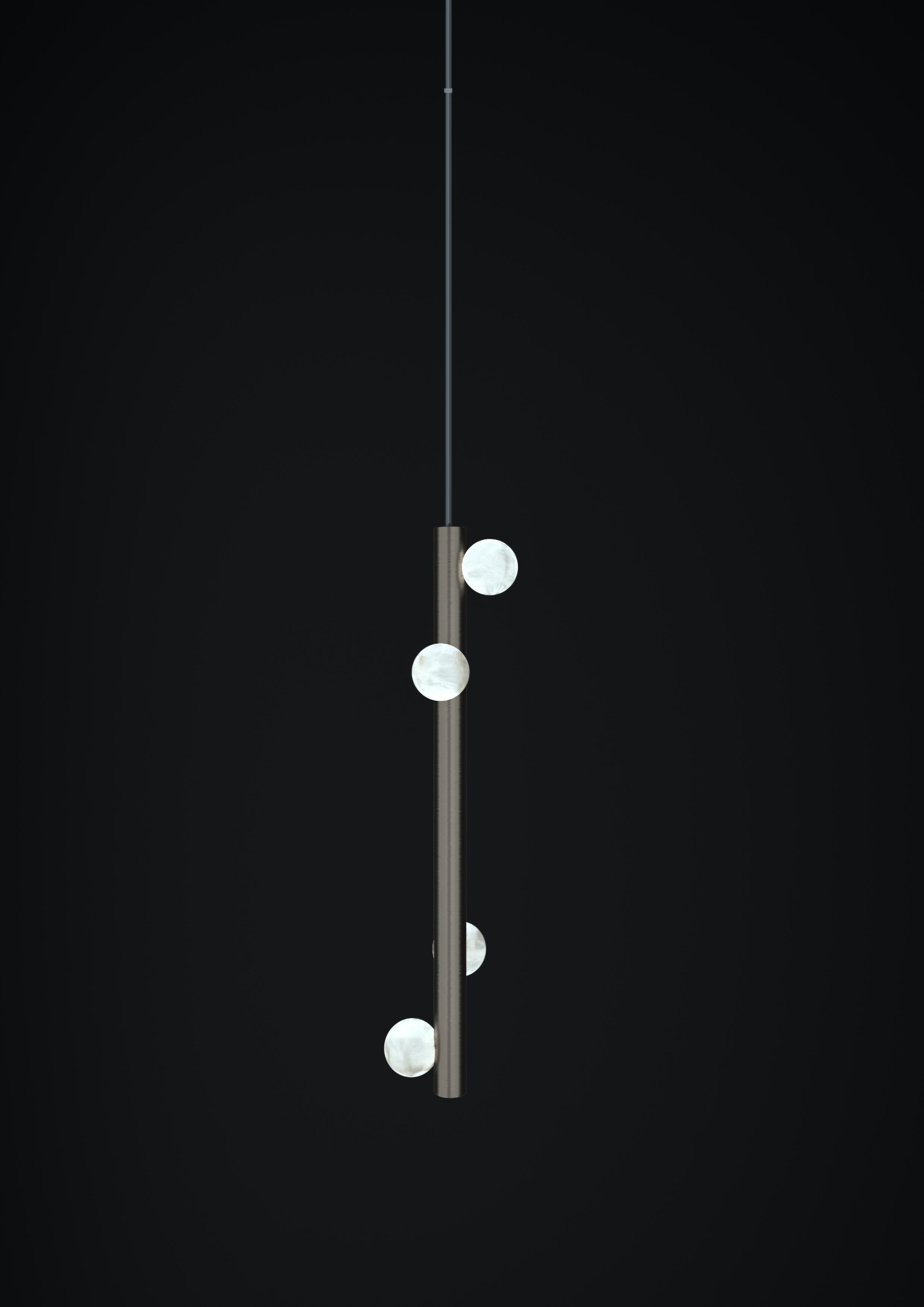 Demetra Brushed Black Metal Pendant Lamp 2 by Alabastro Italiano
Dimensions: D 12 x W 12 x H 60 cm.
Materials: White alabaster and metal.

Available in different finishes: Shiny Silver, Bronze, Brushed Brass, Ruggine of Florence, Brushed Burnished,