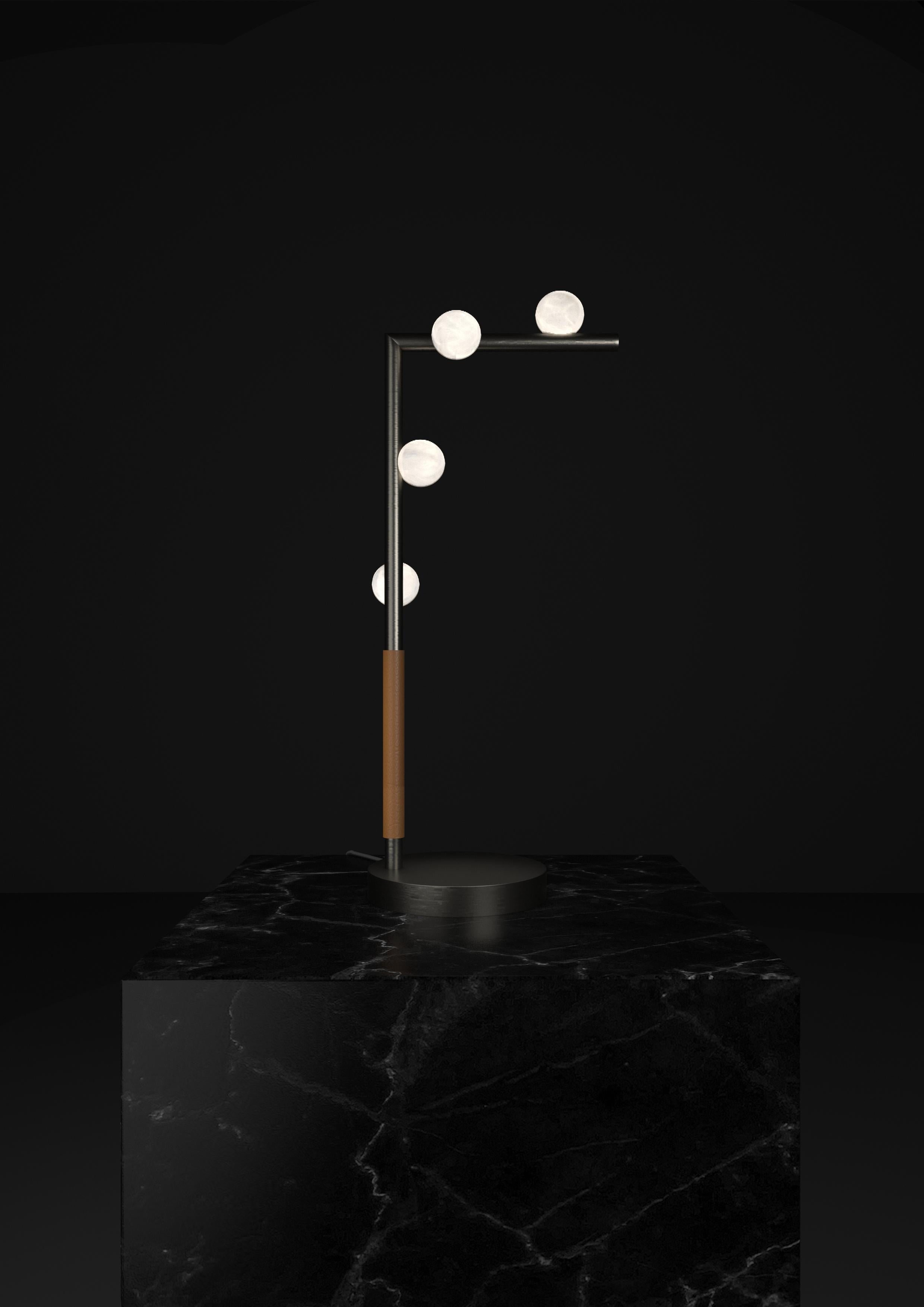 Demetra Brushed Black Metal Table Lamp by Alabastro Italiano
Dimensions: D 20 x W 35 x H 67 cm.
Materials: White alabaster, metal and leather.

Available in different finishes: Shiny Silver, Bronze, Brushed Brass, Ruggine of Florence, Brushed