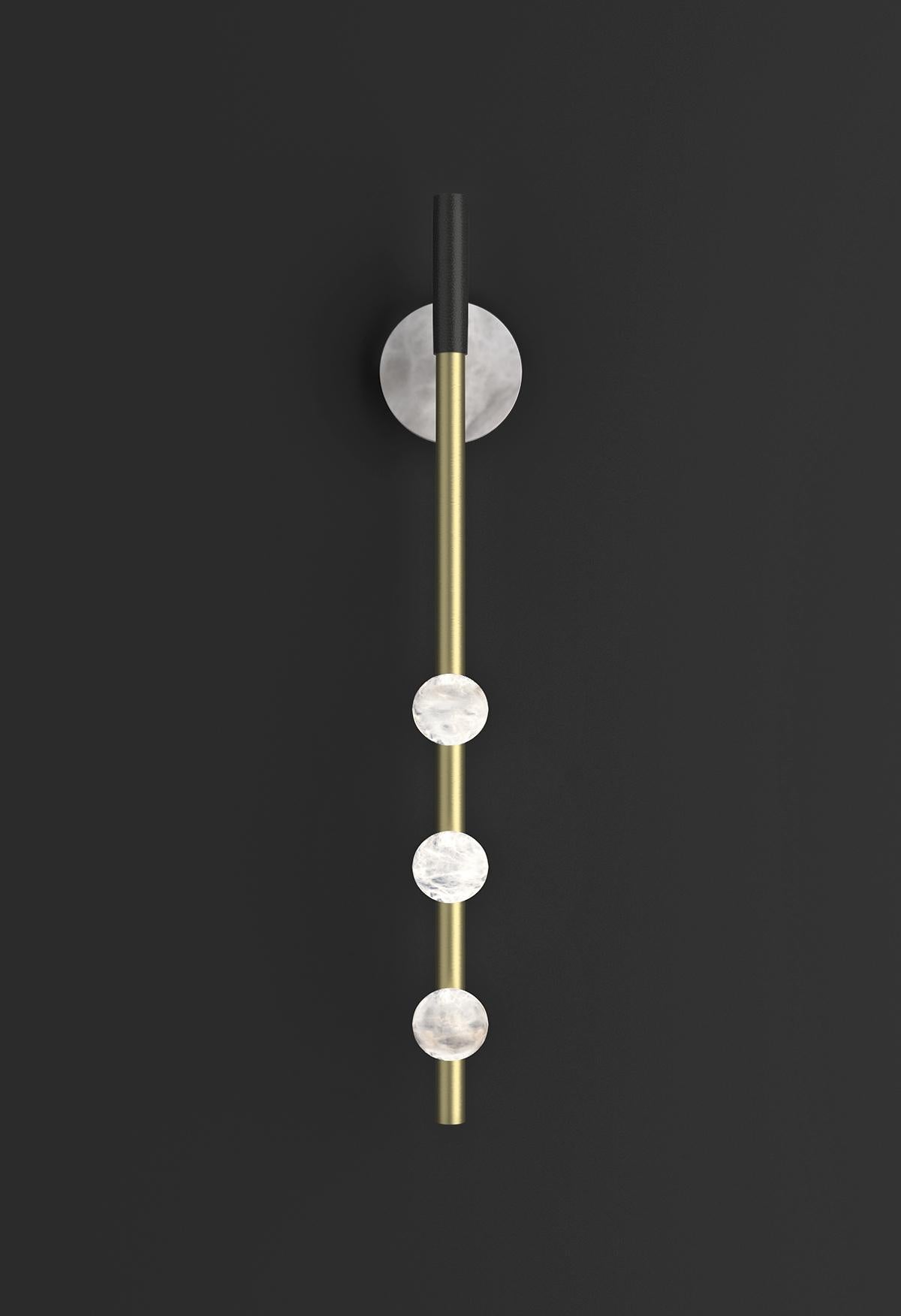 Demetra Brushed Brass Wall Lamp by Alabastro Italiano
Dimensions: D 9 x W 10 x H 60 cm.
Materials: White alabaster, brass and leather.

Available in different finishes: Shiny Silver, Bronze, Brushed Brass, Ruggine of Florence, Brushed Burnished,