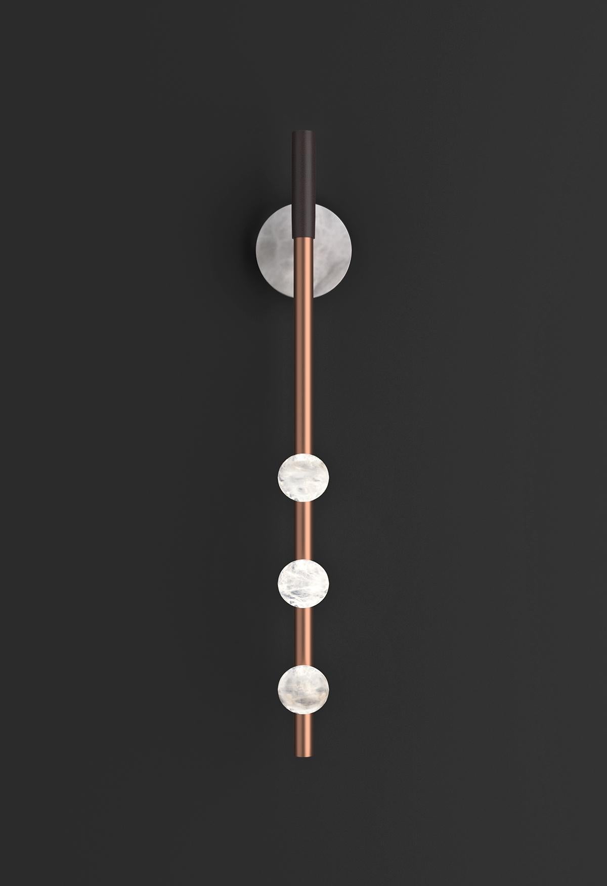 Demetra Copper Wall Lamp by Alabastro Italiano
Dimensions: D 9 x W 10 x H 60 cm.
Materials: White alabaster, copper and leather.

Available in different finishes: Shiny Silver, Bronze, Brushed Brass, Ruggine of Florence, Brushed Burnished, Shiny