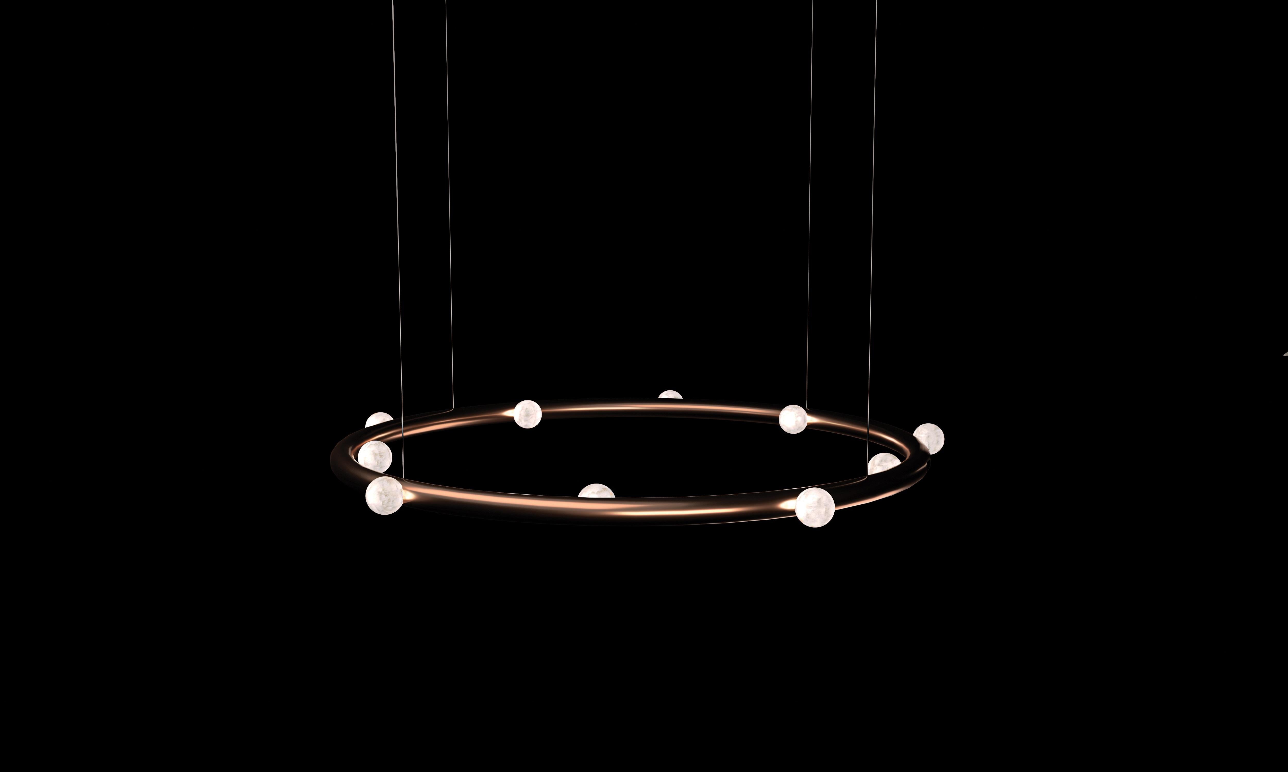 Demetra Round 90 Copper Pendant Lamp by Alabastro Italiano
Dimensions: Ø 90 x H 200 cm.
Materials: White alabaster and copper.

Available in different finishes: Shiny Silver, Bronze, Brushed Brass, Ruggine of Florence, Brushed Burnished, Shiny Gold,