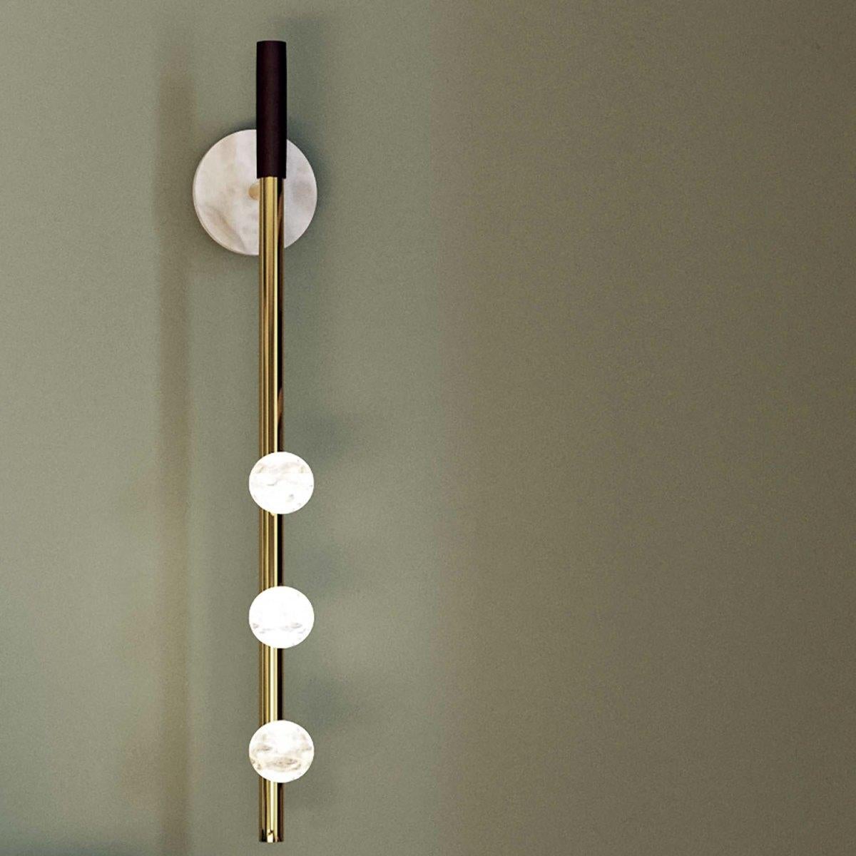 Demetra Ruggine Of Florence Metal Wall Lamp by Alabastro Italiano
Dimensions: D 9 x W 10 x H 60 cm.
Materials: White alabaster, metal and leather.

Available in different finishes: Shiny Silver, Bronze, Brushed Brass, Ruggine of Florence, Brushed