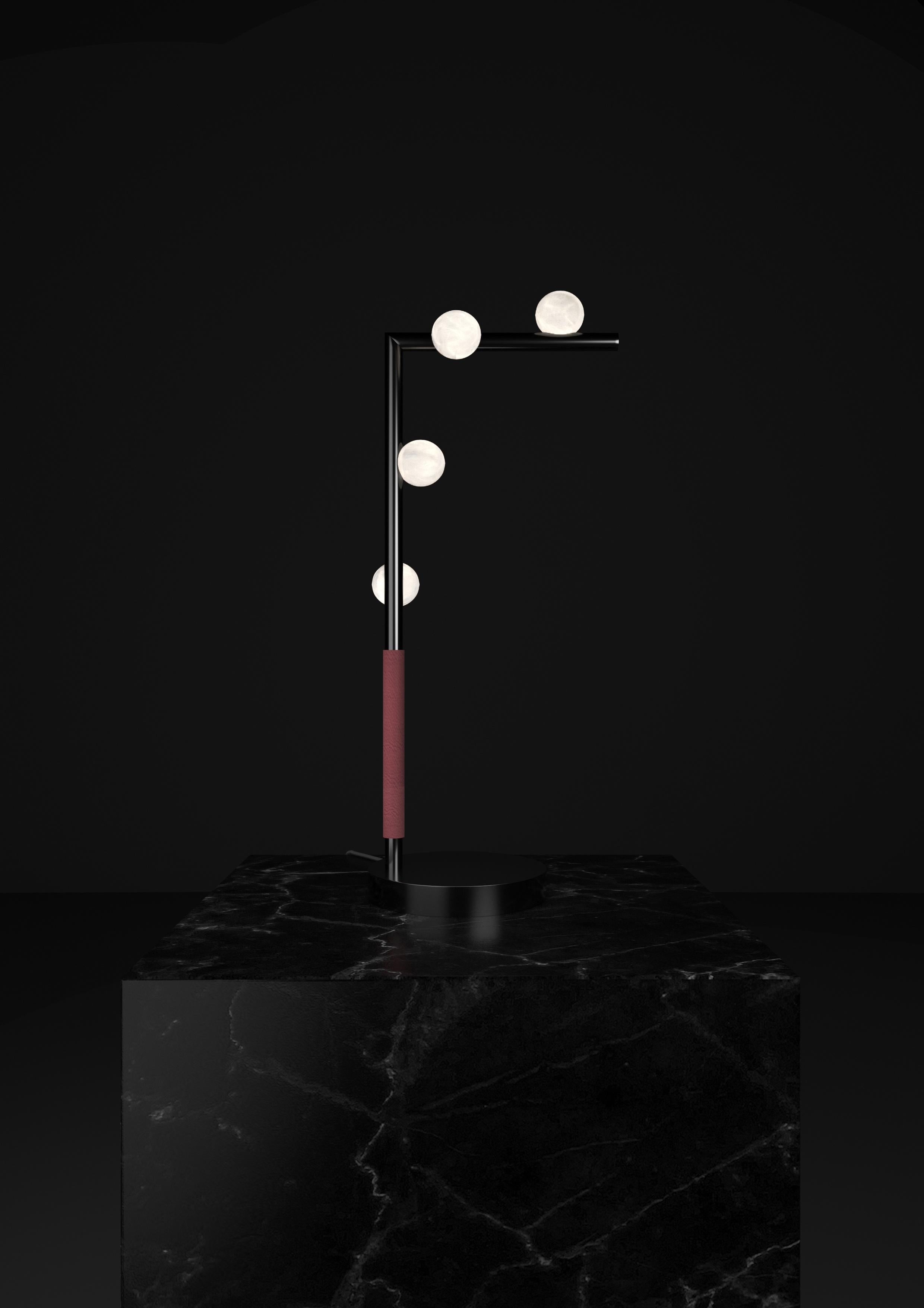 Demetra Shiny Black Metal Table Lamp by Alabastro Italiano
Dimensions: D 20 x W 35 x H 67 cm.
Materials: White alabaster, metal and leather.

Available in different finishes: Shiny Silver, Bronze, Brushed Brass, Ruggine of Florence, Brushed