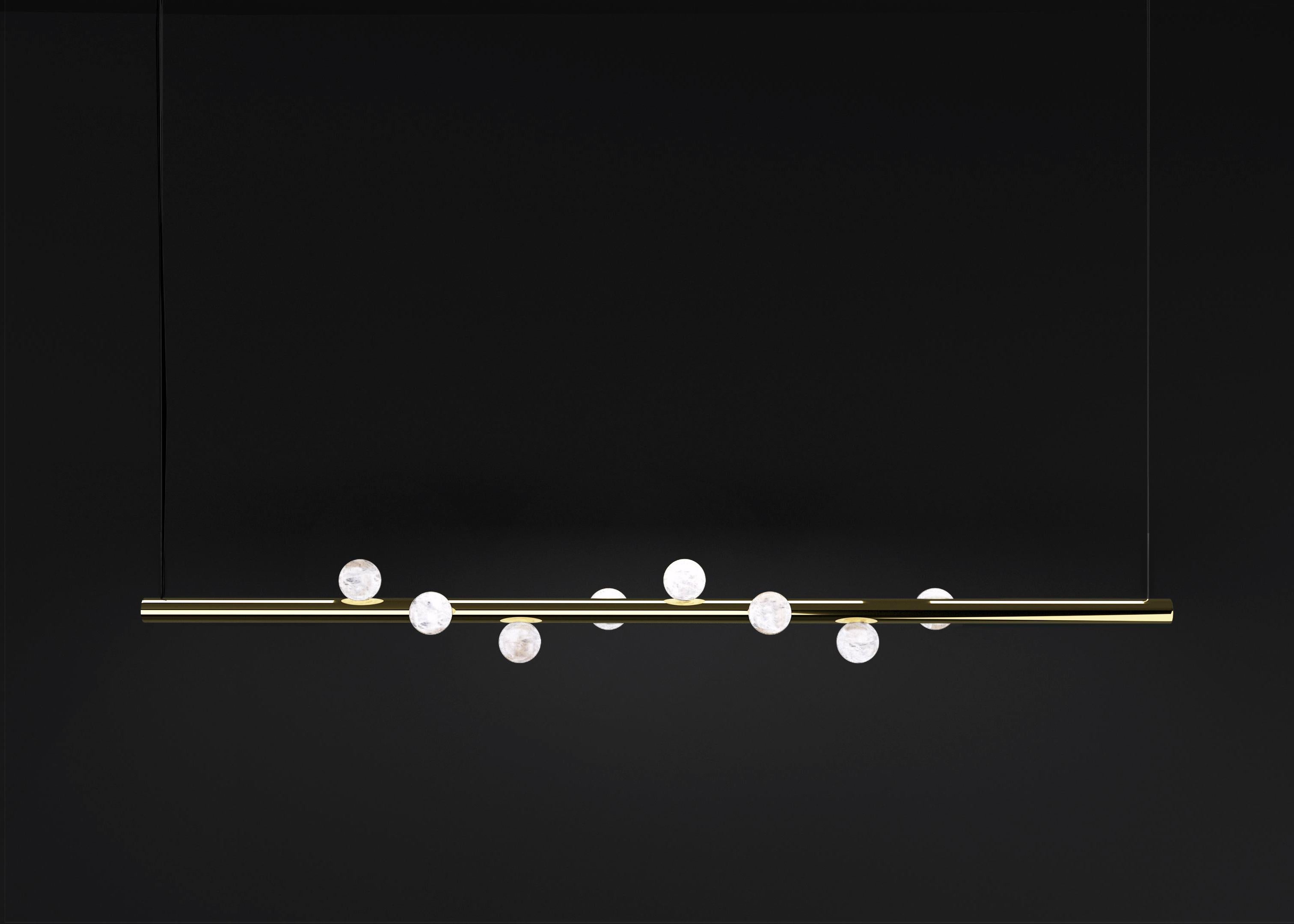Demetra Shiny Gold Metal Pendant Lamp 1 by Alabastro Italiano
Dimensions: D 12 x W 120 x H 12 cm.
Materials: White alabaster, shiny gold metal and leather.

Available in different finishes: Shiny Silver, Bronze, Brushed Brass, Ruggine of Florence,
