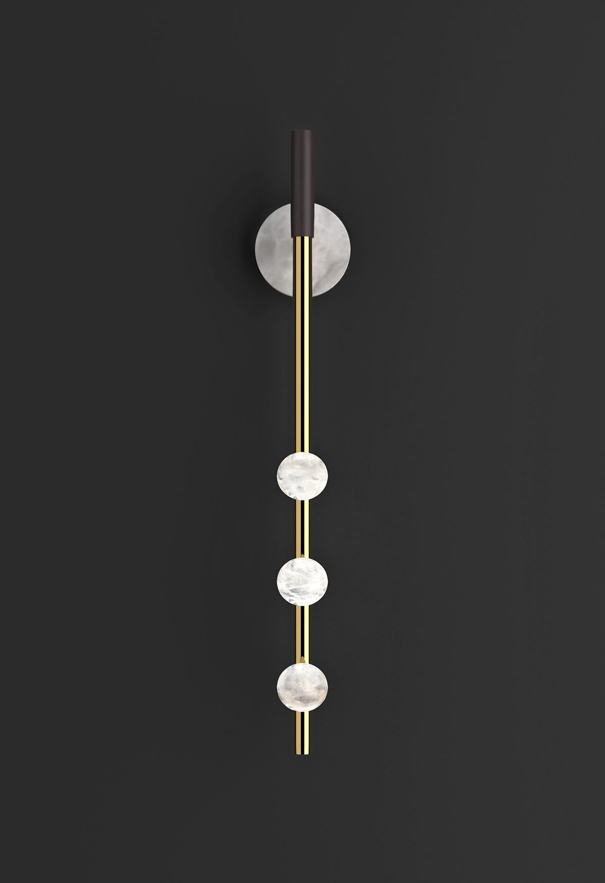 Demetra Shiny Gold Metal Wall Lamp by Alabastro Italiano
Dimensions: D 9 x W 10 x H 60 cm.
Materials: White alabaster, metal and leather.

Available in different finishes: Shiny Silver, Bronze, Brushed Brass, Ruggine of Florence, Brushed Burnished,