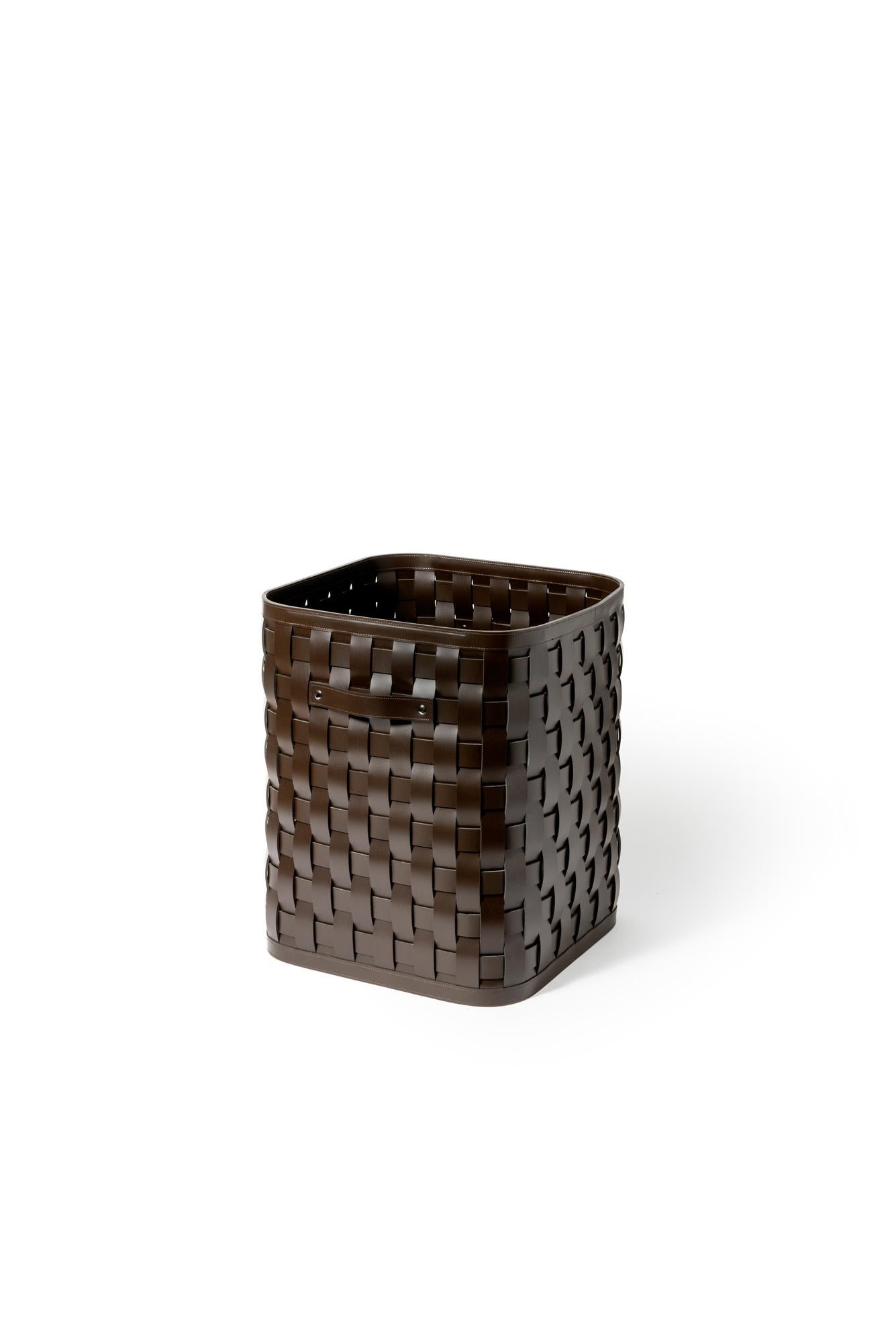 Sleek and functional, this basket is handcrafted with meticulous care and made of handwoven leather that is 100% eco-friendly, durable, and easy to clean, suitable for both indoors and outdoors.

The functional lid makes this basket particularly