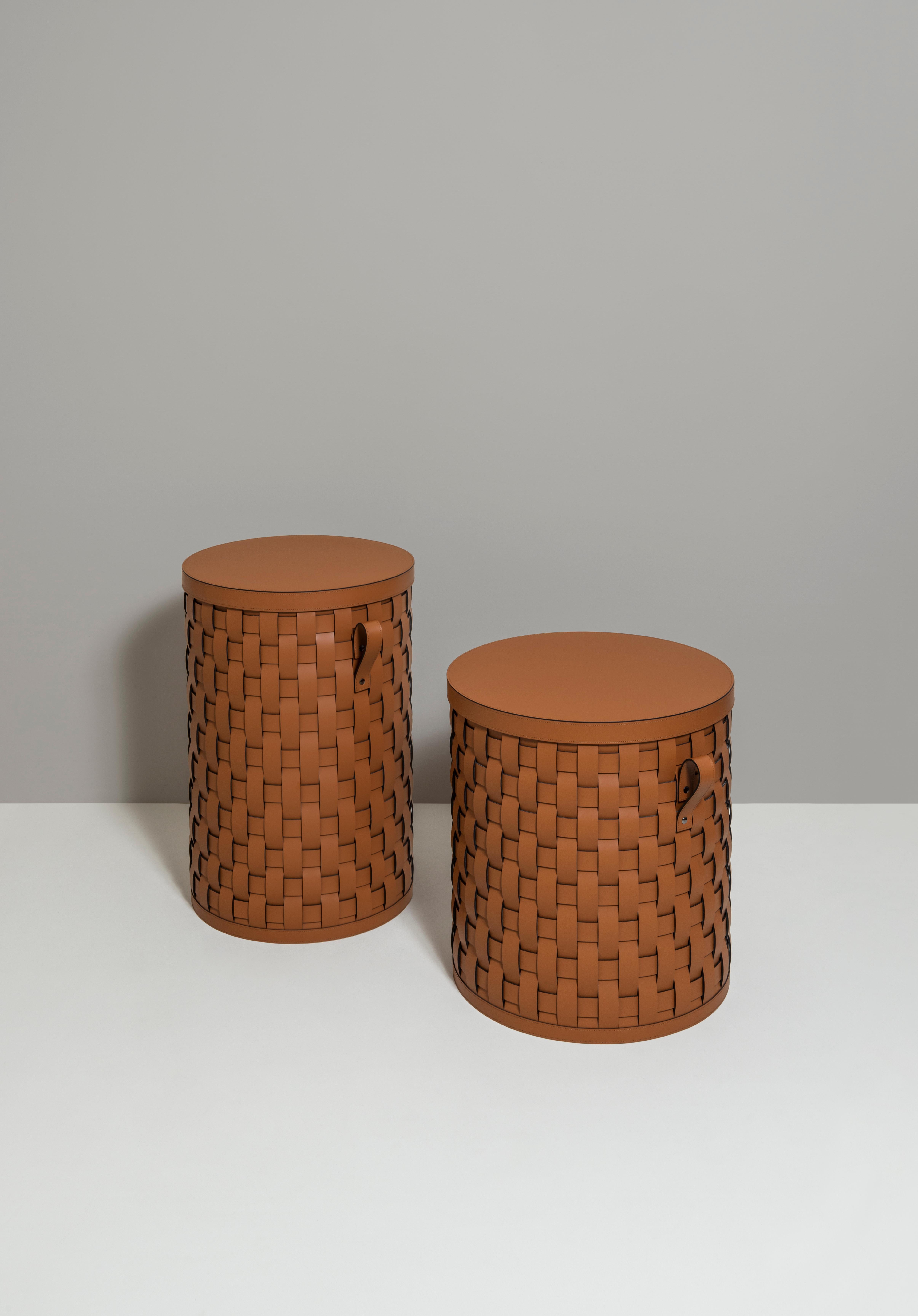 Pinetti's tall Demetra basket is handmade in Italy from eco-friendly and water-resistant brown leather making it useful for indoor or outdoor storage use.