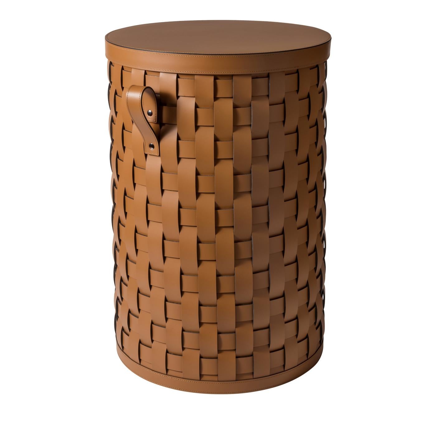 Designed and crafted exclusively by Pinetti, this striking leather basket offers a luxurious and practical solution to storage around the house. Beautifully handwoven leather strips in richly textured, tan-colored, eco-friendly leather that is