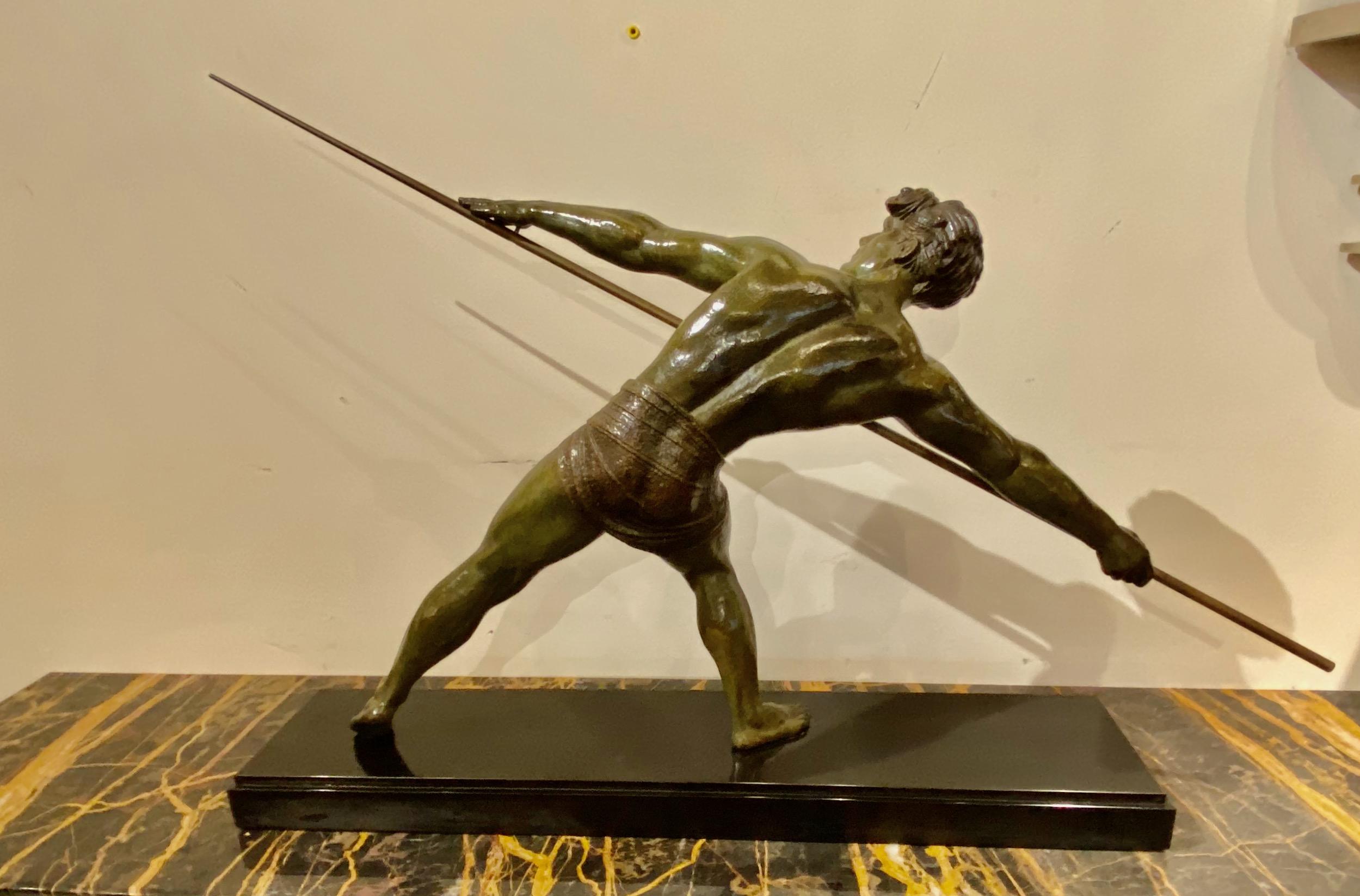 Demétre Chiparus ‘Athlete with Javelin’ Art Deco sculpture. The original pristine condition of petit bronze (white metal) in verdigris patina has gold accent details as well. Chiparus is the most famous Art Deco sculptor for many things, especially