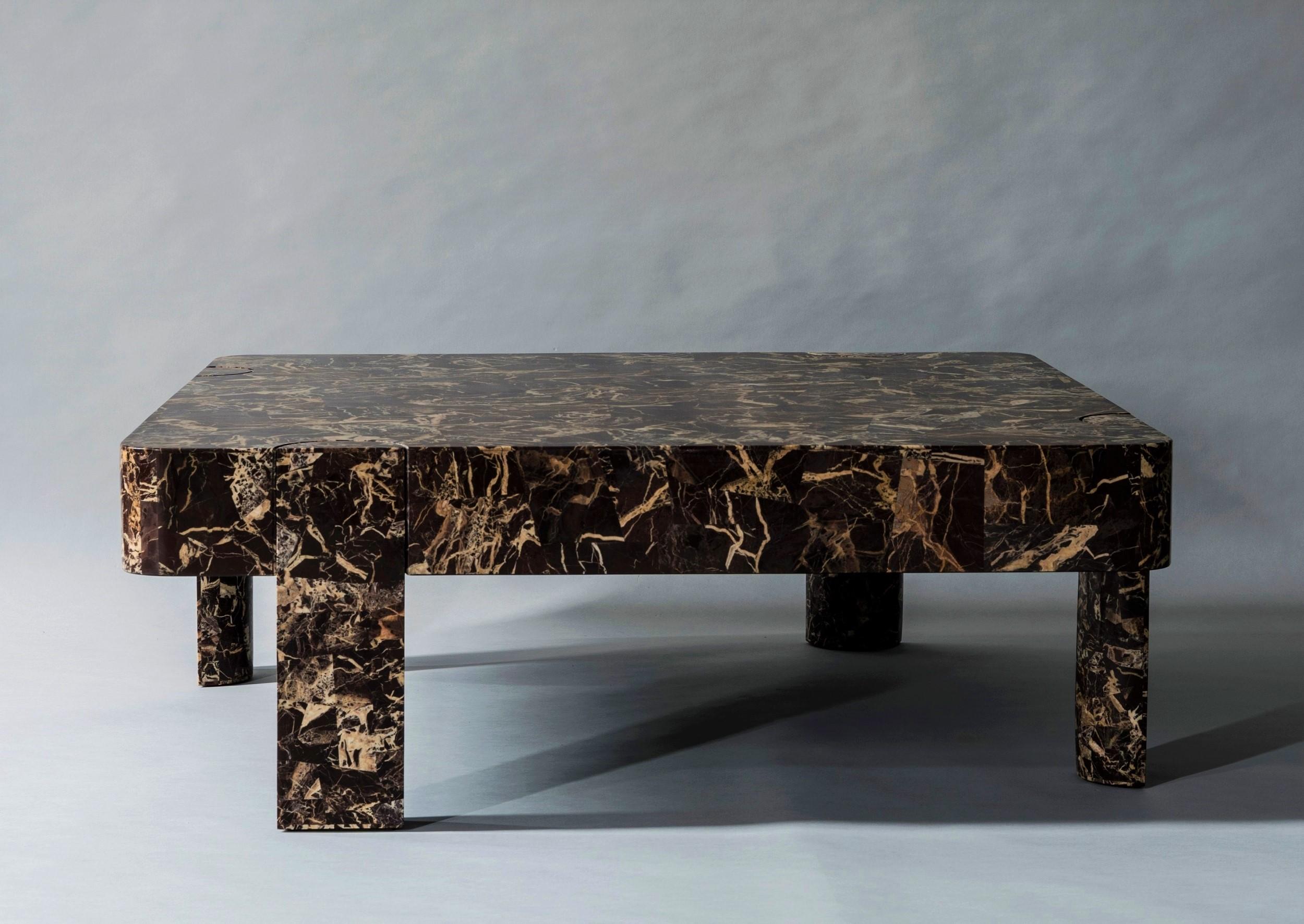 The Demi Collection gets its name from the irregularly placed cylindrical legs that are bisected and inset into its rounded tops, forming a half-circle at each joint. Exquisite stone marquetry comprising rare finishes such as claret dolomite,