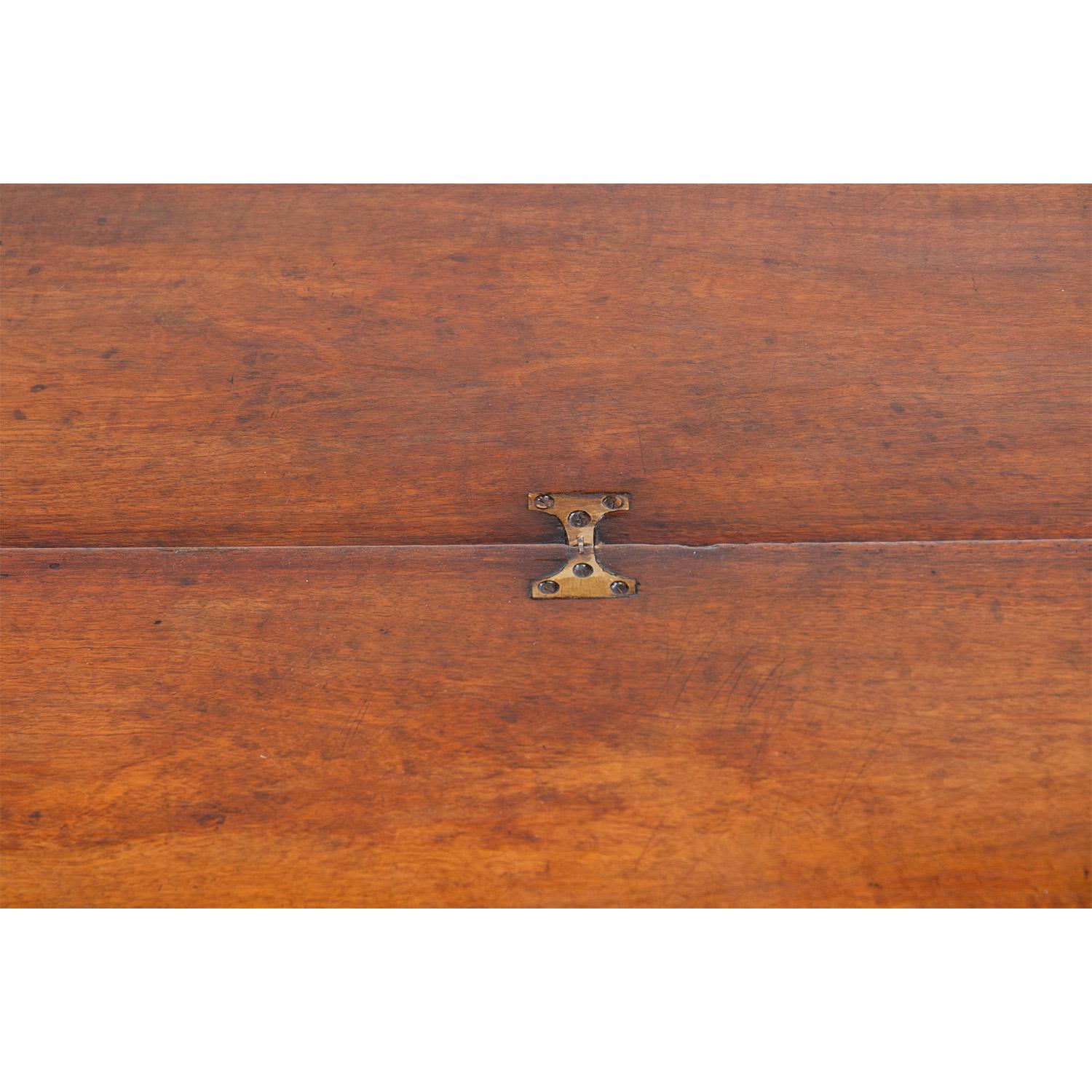 Elegant, understated demilune table made from cherrywood, circa 18th century.
Measures: 29.75