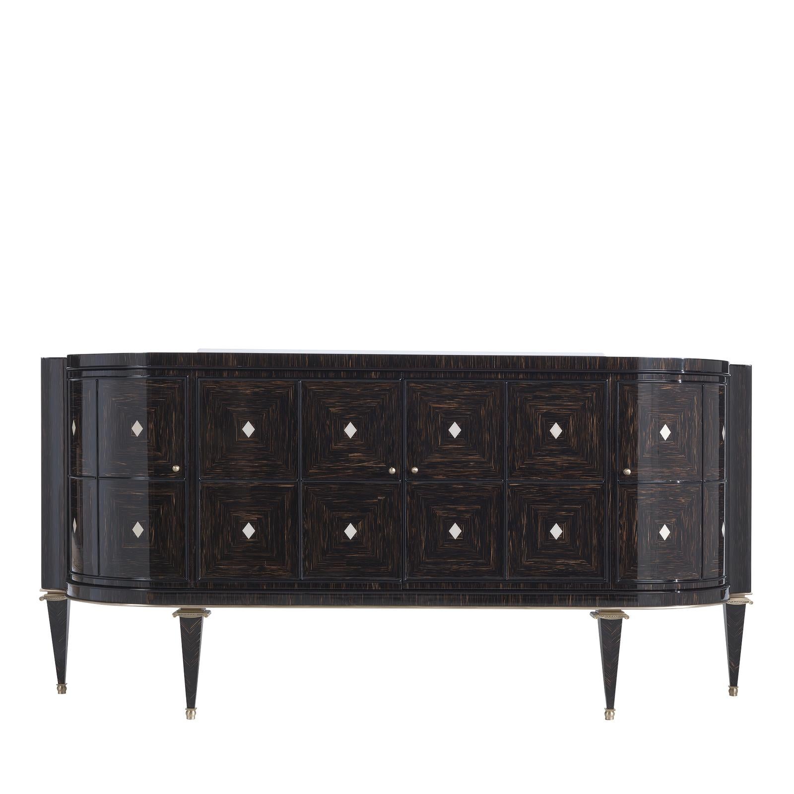 Standing tall on four tapered legs, this stately sideboard exemplifies a distinguished approach to modern, functional design. Crafted of solid palm wood, the streamlined demilune silhouette features two central doors flanked by two side doors