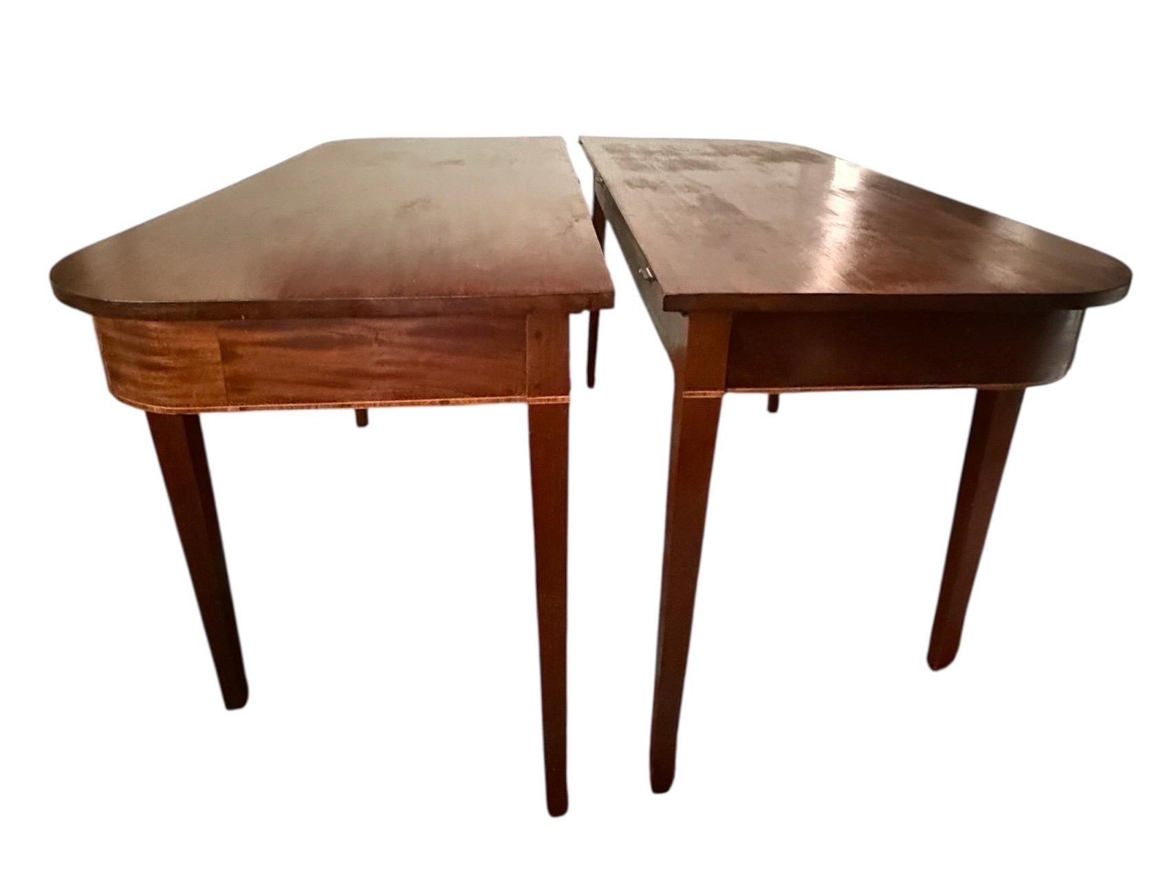 Antique Large Demi-Lune Shaped Table, we have 2 of them. A great way to anchor 2 sides of a space and display items. These would also make beautiful entryway tables or retail tables to display beautiful decor and other gems!

DIMENSIONS
W48” x