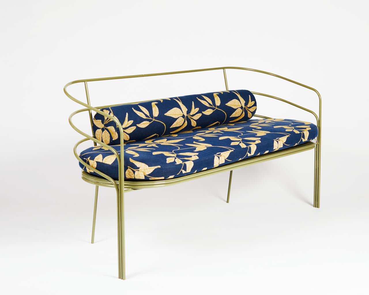 DeMille is ready for her close up! Inspired by the streamline moderne architecture found on the east side of Los Angeles, the DeMille sofa hearkens back to LA’s Hollywood Regency era. This piece is suitable for indoor or outdoor use. The frame is