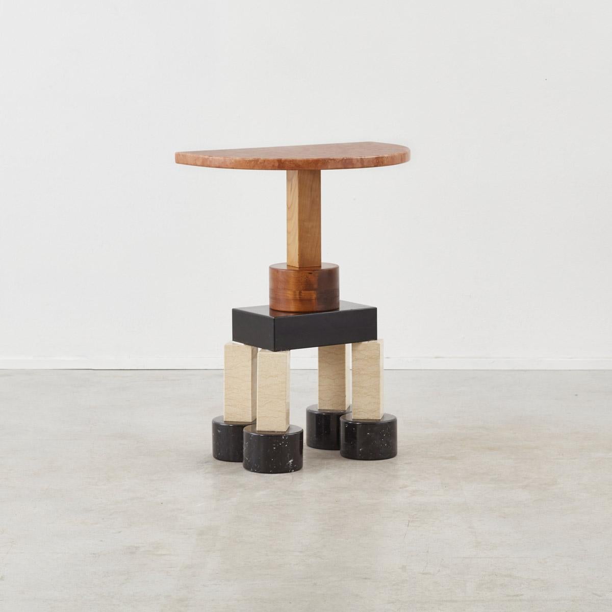 Ettore Sottsass (1917–2007) was an Italian architect and designer during the 20th century. His body of work includes furniture, jewelry, glass, lighting and objects, as well as many buildings and interiors. He is perhaps most celebrated as the