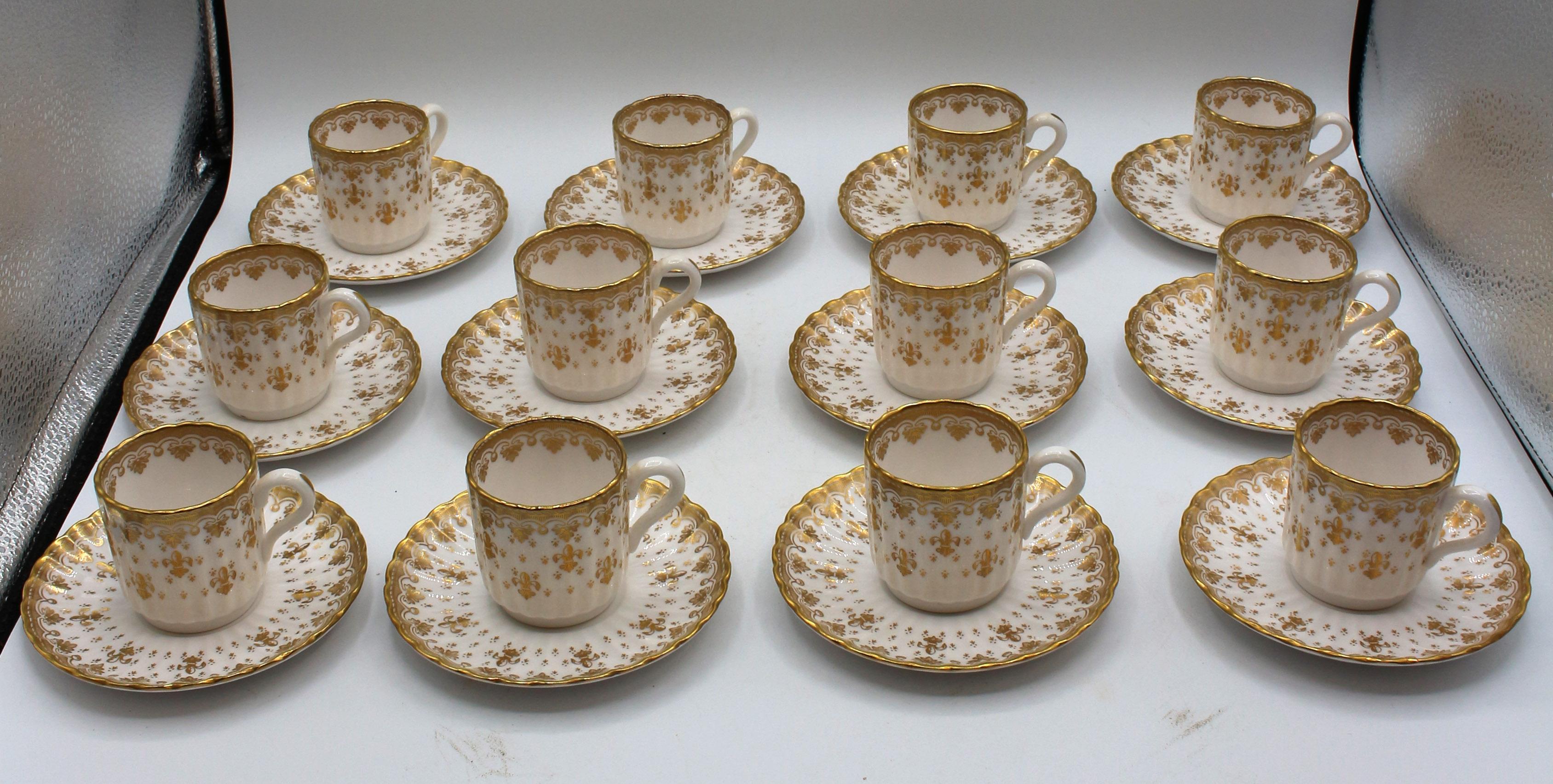 Demitasse Service for 12 with Large Pot & 12 Cups, Spode's Fleur de Lys Gold, Mid-20th century, bone china. Fine gilt decoration. Discontinued pattern. Fine condition.
Cup: 2 1/8