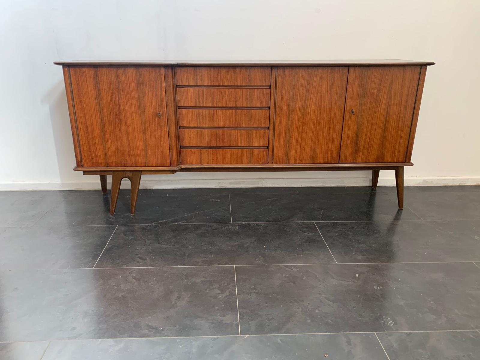 Demountable rosewood sideboard, 1960s
Packaging with bubble wrap and cardboard boxes is included. If the wooden packaging is needed (crates or boxes) for US and International Shipping, it's required a separate cost (will be quoted separately).