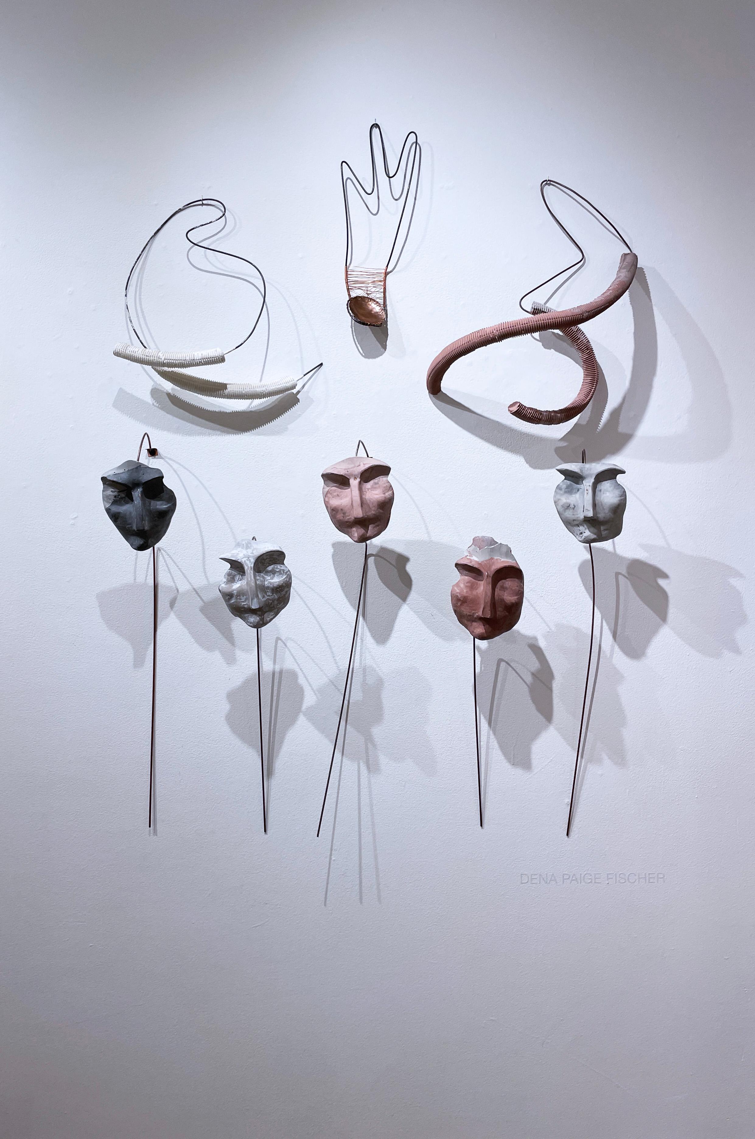 metal face sculpture