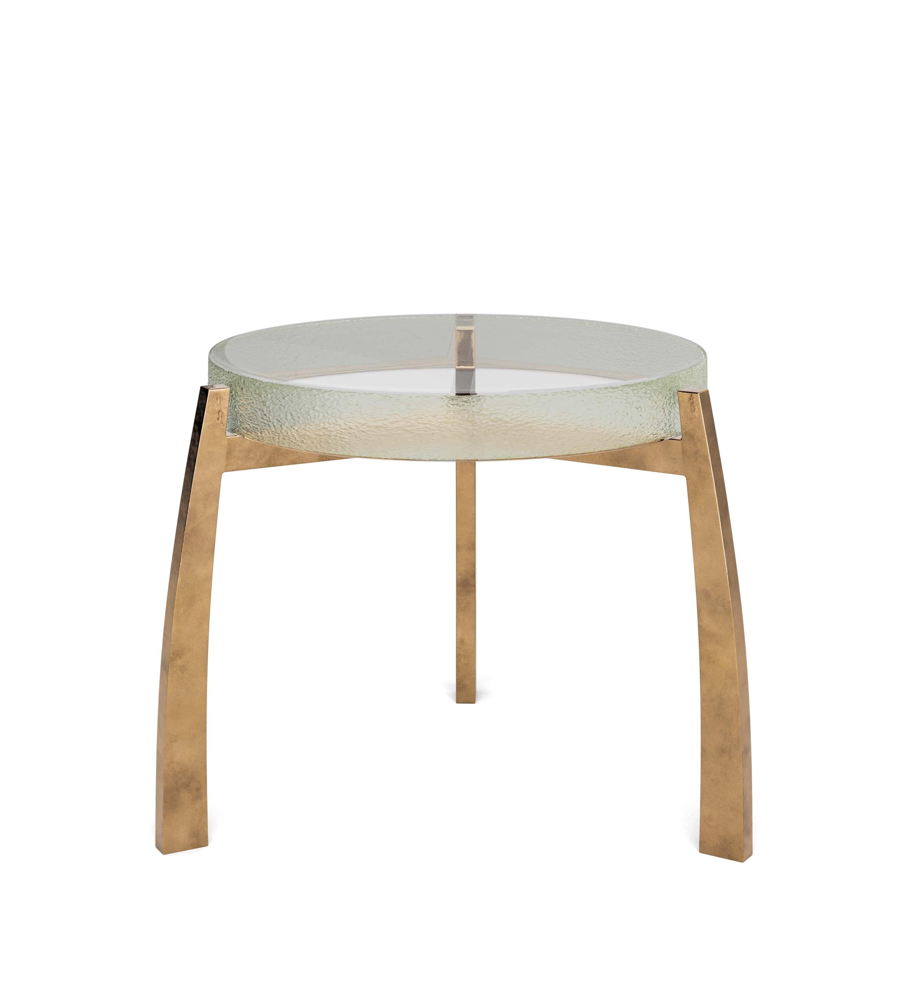The Denali Side Table exemplifies sophisticated design through the artful pairing of cast glass and metal craftsmanship. Inspired by the majestic peaks of its namesake mountain, this distinctive accent piece creates a striking visual statement with