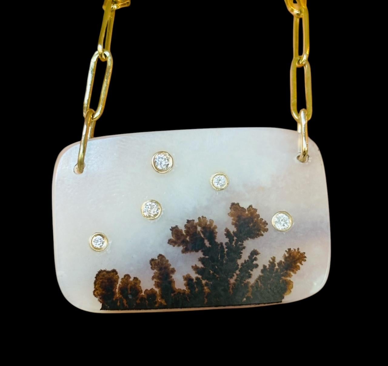 COLLANA DI AGATA DENDRITICA CON DIAMANTI

Agata dendritica, diamanti, oro 14k

L'agata dendritica è una rarità ricercata che presenta inclusioni simili a rami. Basta uno sguardo per capire perché questa gemma è così amata. 

Le inclusioni simili ad
