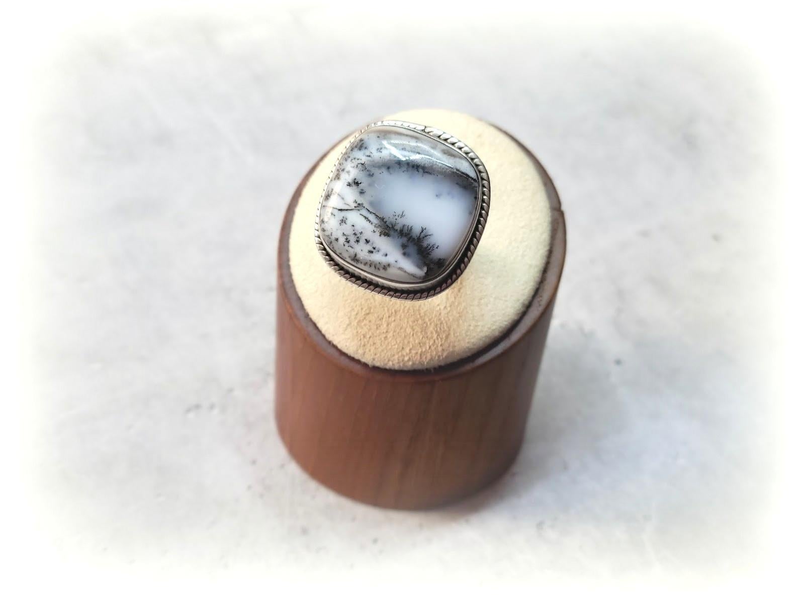 This lovely modern, comfortable ring is from a high-quality Dendritic agate cabochon in the sterling silver set.

The Dendritic agate stone is approximately 22mm x 21mm
The US size of the ring is 7. 
The weight of the ring is 10.6 grams.

The field