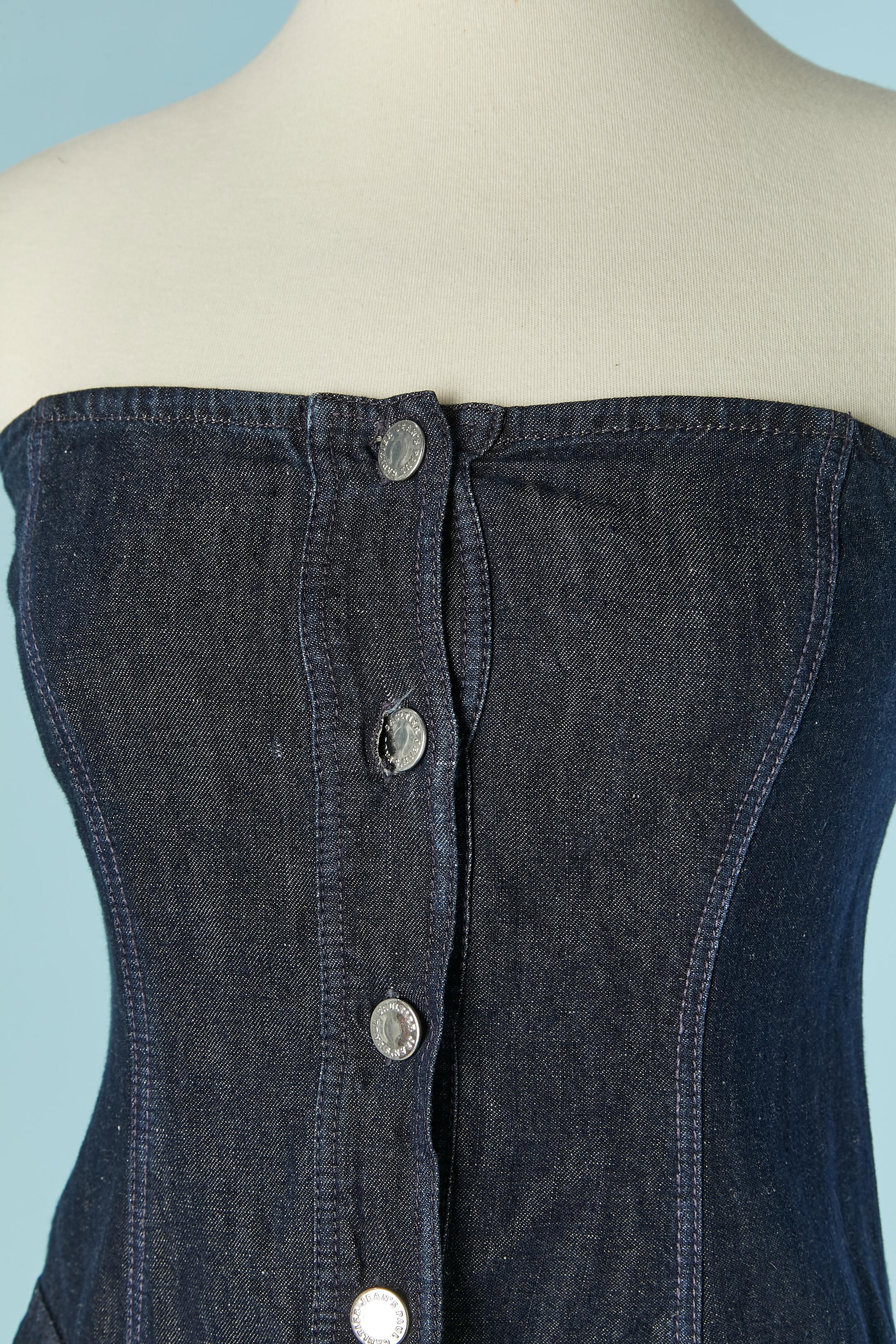 Denim bustier dress. Fabric composition: 61% cotton, 39% linen. 
Branded button and buttonhole closure on the middle front and same on the pocket flap. Gather around the waist. elastic band on the top middle back. 

SIZE 42 (It) 38 (Fr) M 