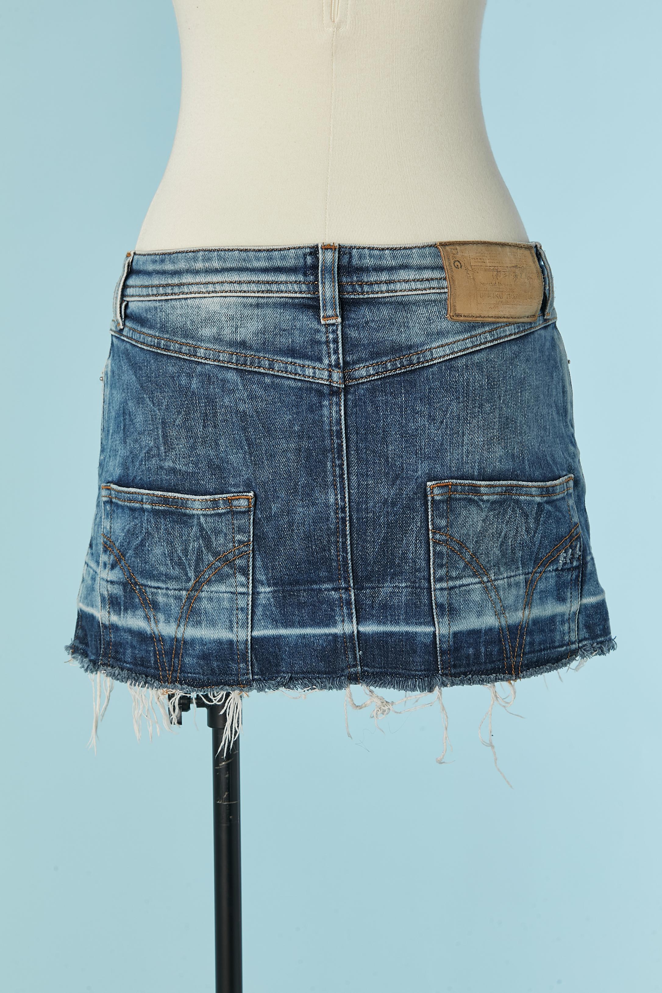 Women's Denim mini skirt with raw edge and fringes D&G by Dolce & Gabbana For Sale