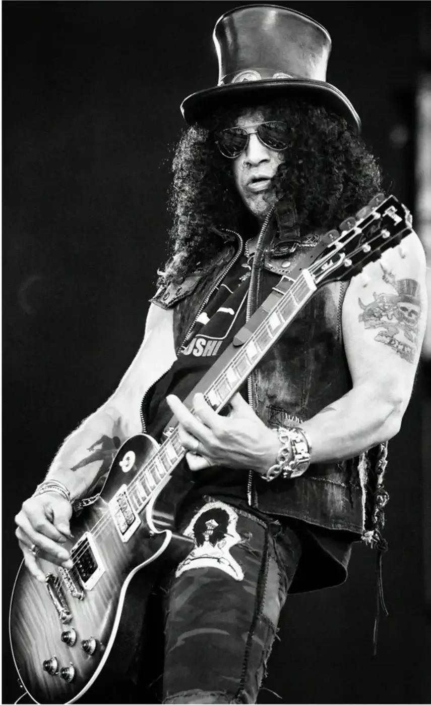Slash von Velvet Revolver auf der Bühne, Download Festival, Donington Park, England, 2007

Auf Bestellung gedruckt auf Hahnemühle Photo Rag 308gsm Fine Art Paper von einer Hahnemühle-zertifizierten Druckerei in London

Alle verfügbaren Größen und