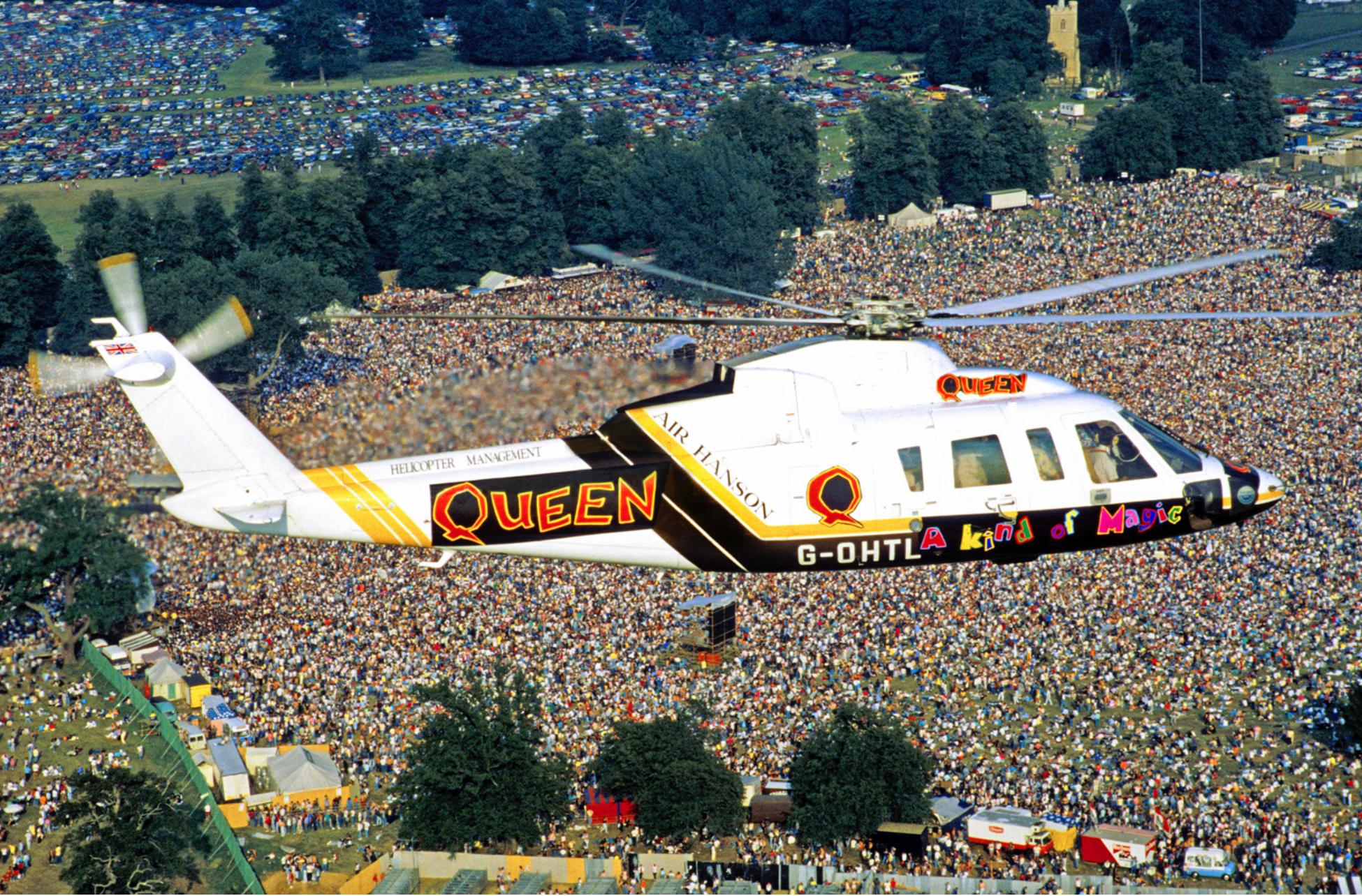 Fine art 20x24" print of rock band Queen, Freddie Mercury, Brian May, John Deacon and Roger Taylor, arriving by helicopter to Knebworth Park in the UK. Taken by acclaimed photographer, Denis O'Regan on August 9th 1986 for what would be Freddie