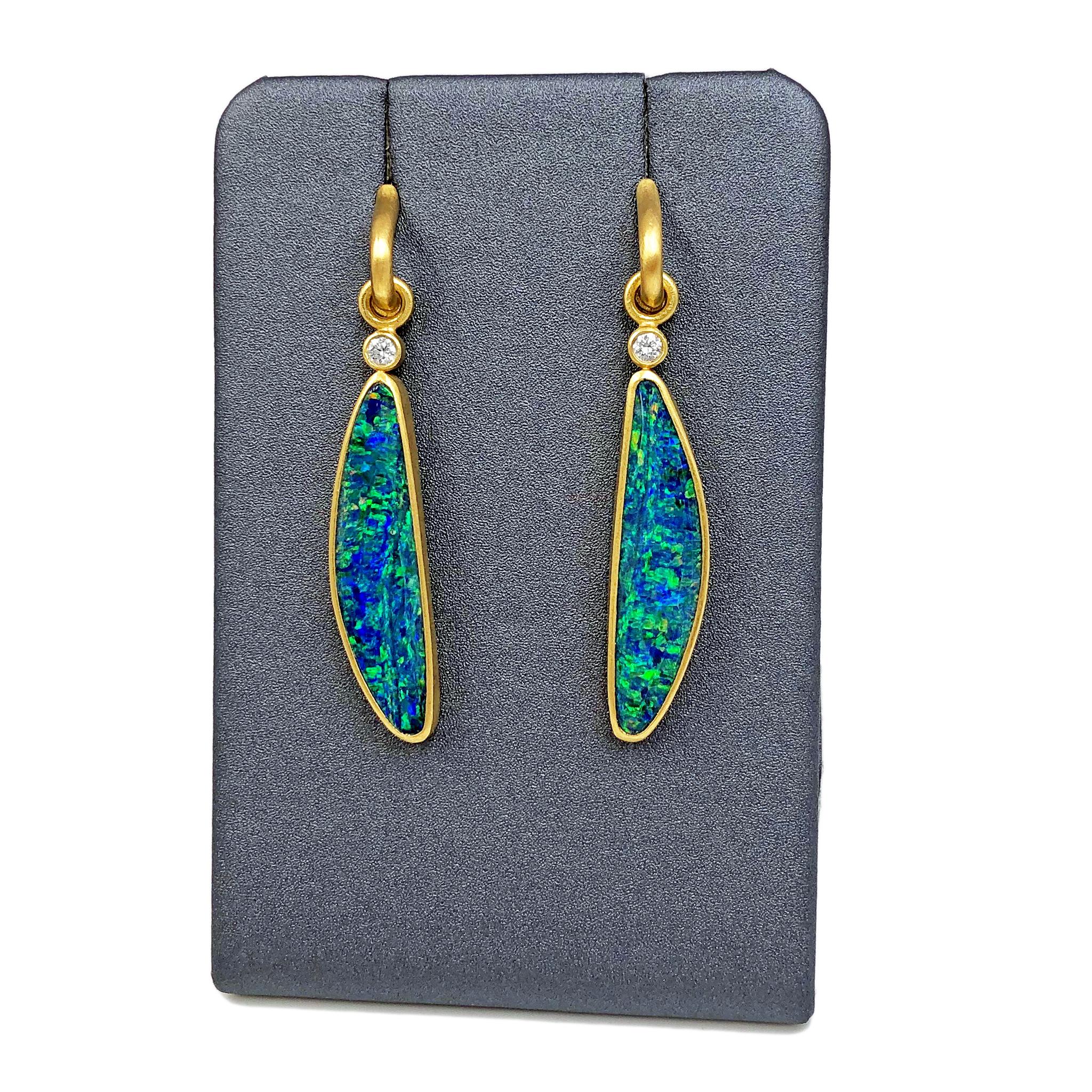 One-of-a-Kind Drop Earrings handcrafted by jewelry maker Denise Betesh in signature matte-finished 22k yellow gold featuring an exceptional matched pair of deep blue opal doublets totaling 9.63 carats showcasing strong neon green flash complemented
