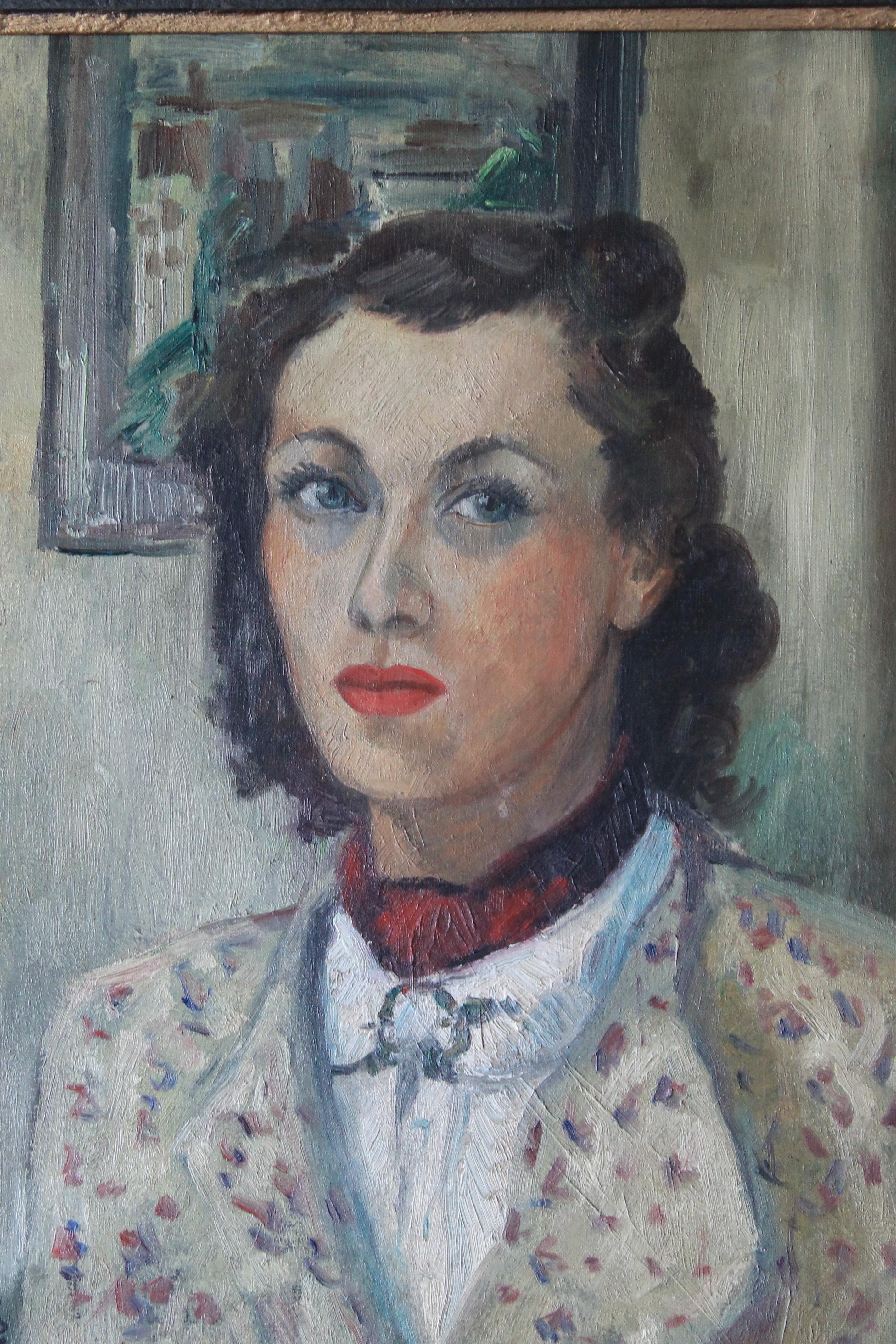 A bold and colourful self portrait of the artist Denise Calle (1915-1998), signed in the lower left corner and dated 1938.  This unusual portrait has plenty of eye catching interest.  With typically 1930's attire and hair style, she sits in front of