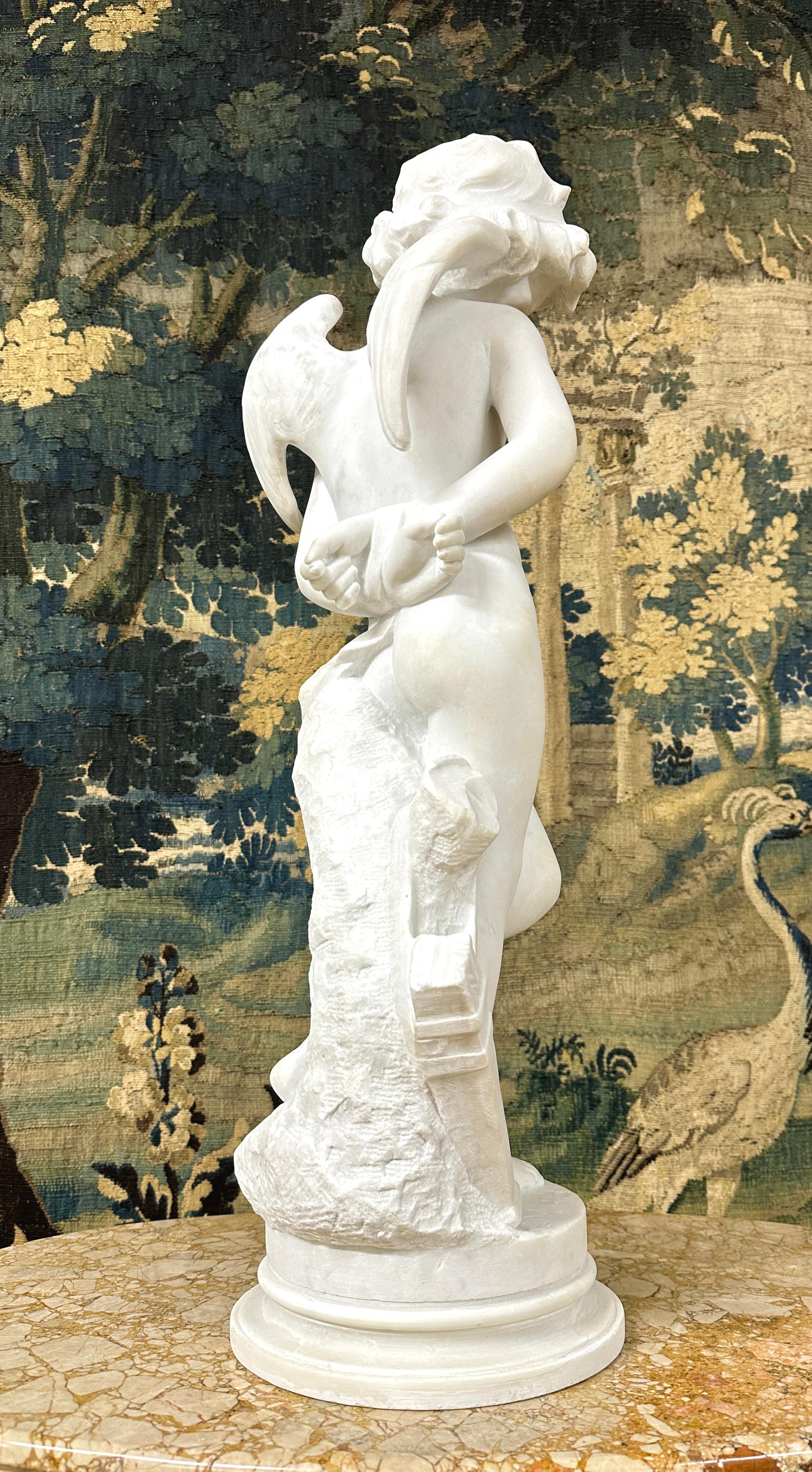Statue de Cupidon en marbre blanc, signée Denise Delavigne 1