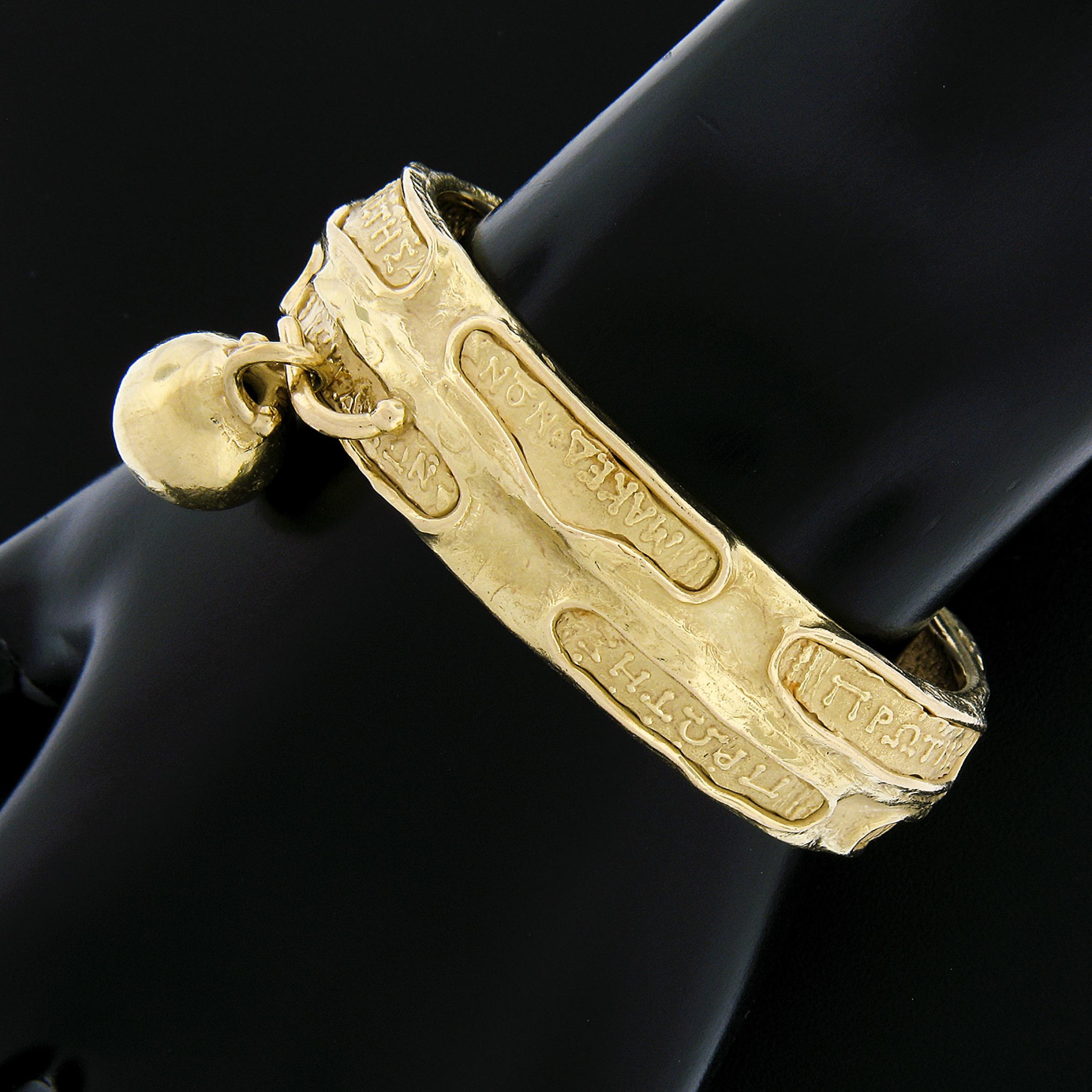 Material: Solid 18k Yellow Gold
Weight: 92.30 Grams
Chain Type: Textured Greek Writing Open Cuff
Length: Will fit up to a 6 to 6.25 inch wrist.
Clasp: No Clasp
Width: 16.1mm (0.63