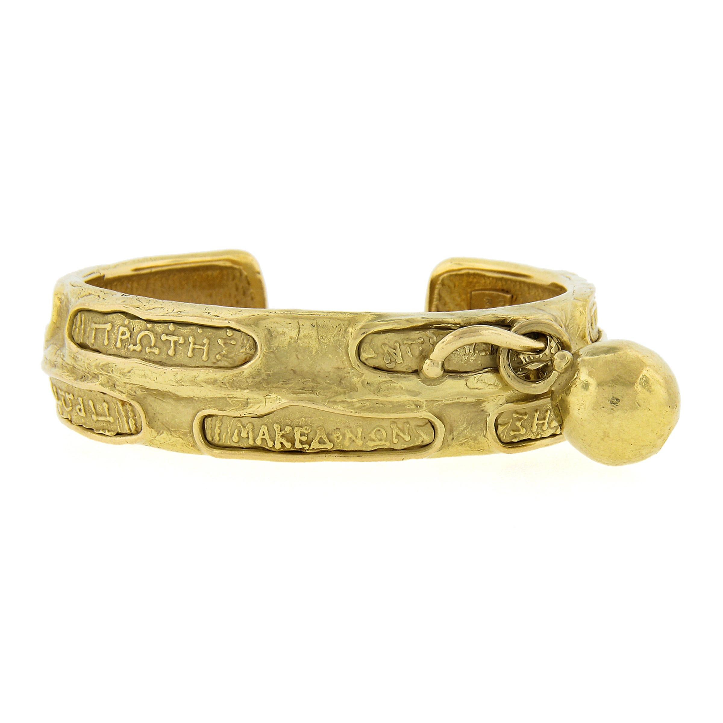 Women's Denise Roberge 18k Yellow Gold Greek Writing Open Cuff Bracelet w/ Dangle Ball For Sale