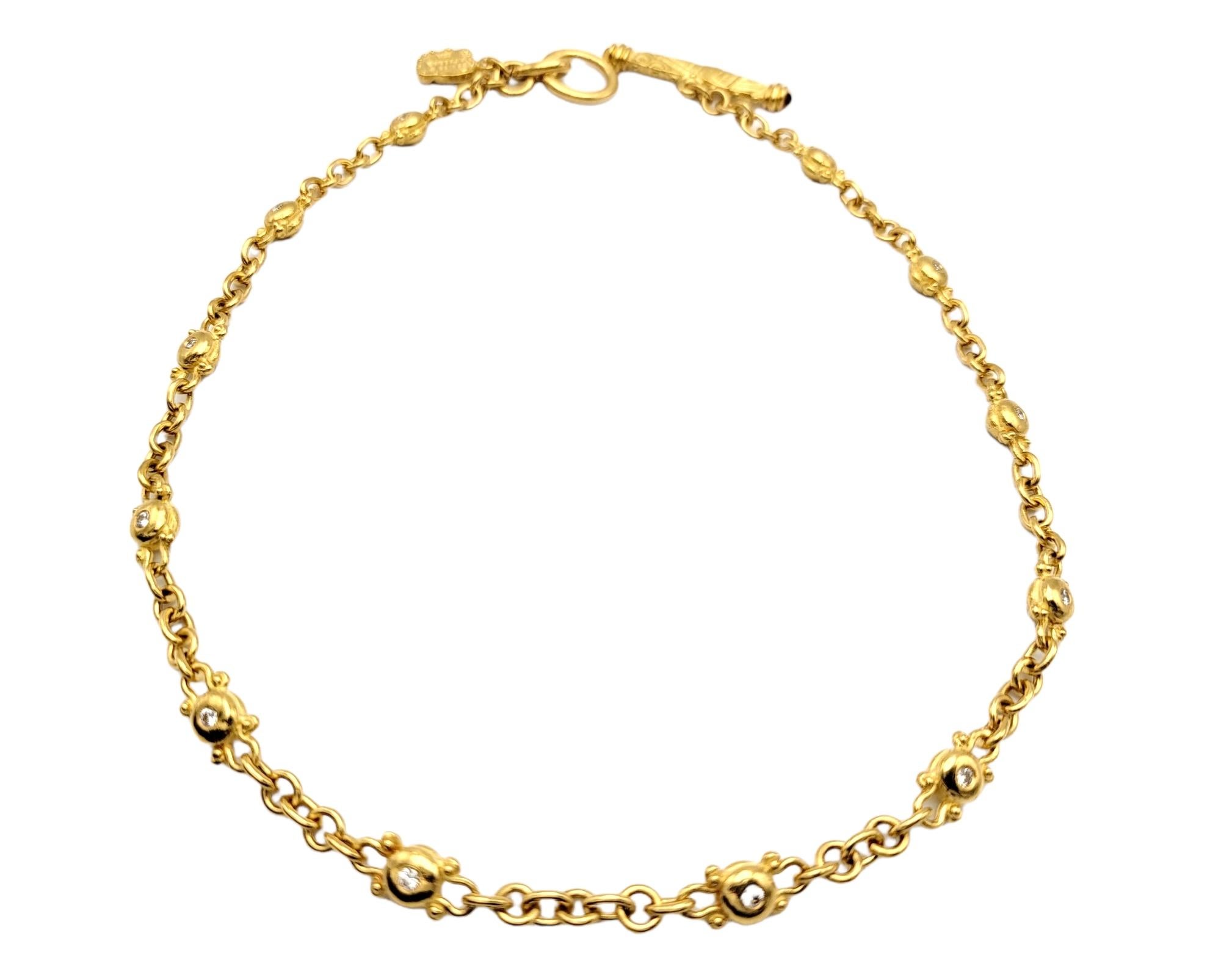 Gorgeous 22 karat gold link necklace by designer Denise Roberge. Warm yellow gold bubble style links are accented with glittering diamonds to create a luxurious look. We love how this versatile piece can be dressed up or down and worn with just