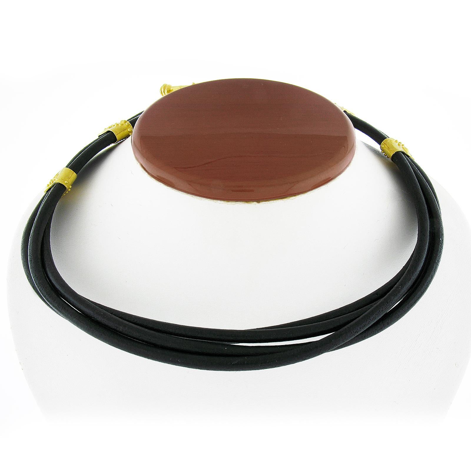 Material: Solid 22k Yellow Gold w/ Black Leather Cord
Weight: 75.69 Grams
Chain Type: Black Leather Multi Cord
Chain Length:	17.5 Inches (approx.)
Clasp Bar Length: 43.6mm (1.7
