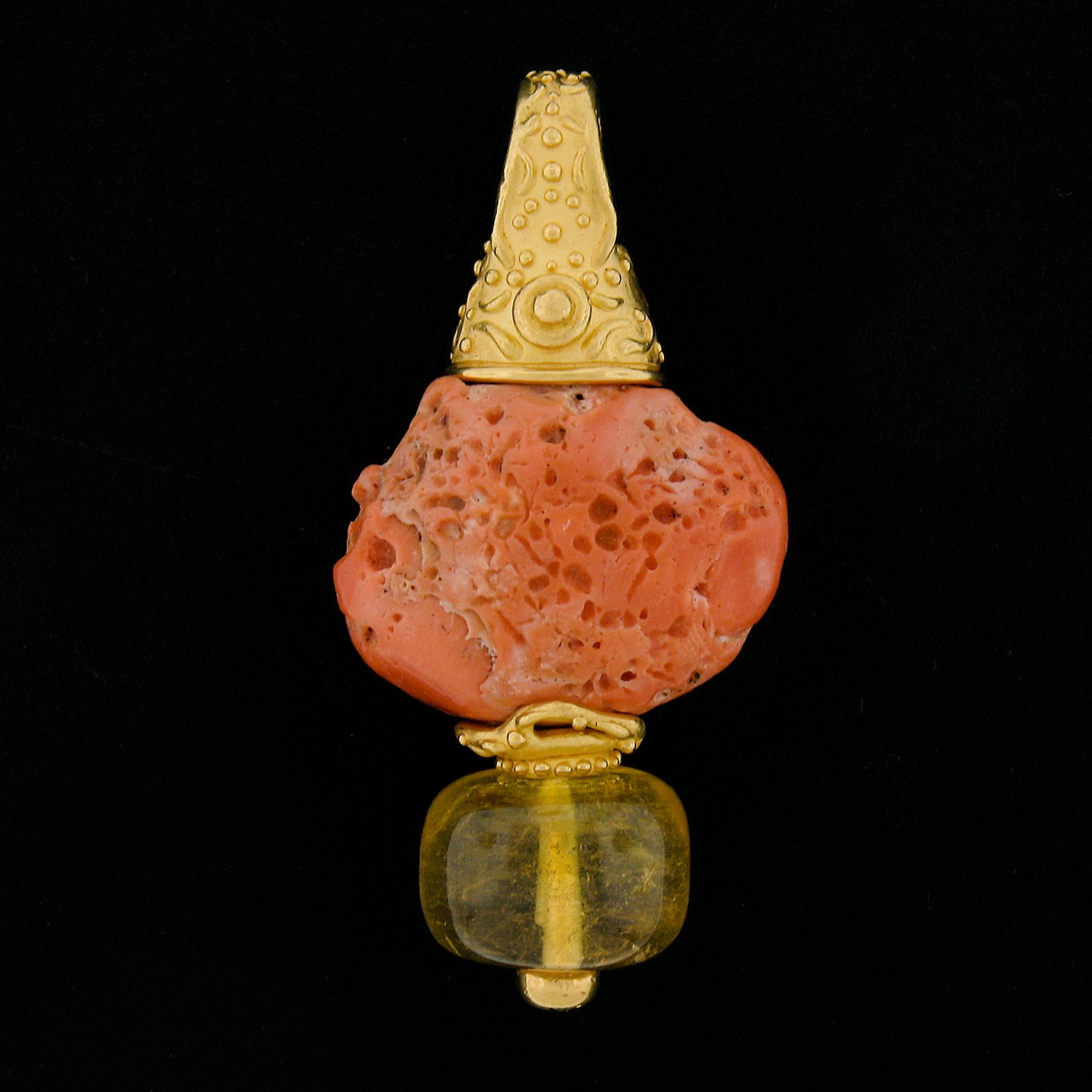 --Stone(s):--
(1) Natural Genuine Coral - Salmon Pink Color - 19.2x28.1mm (approx.)
(1) Natural Genuine Citrine - Rondelle Shape - Yellow Color - 16.7mm each (approx.)

Material: Solid 22k Yellow Gold 
Total Weight: 34.86 Grams
Overall Height: 58mm