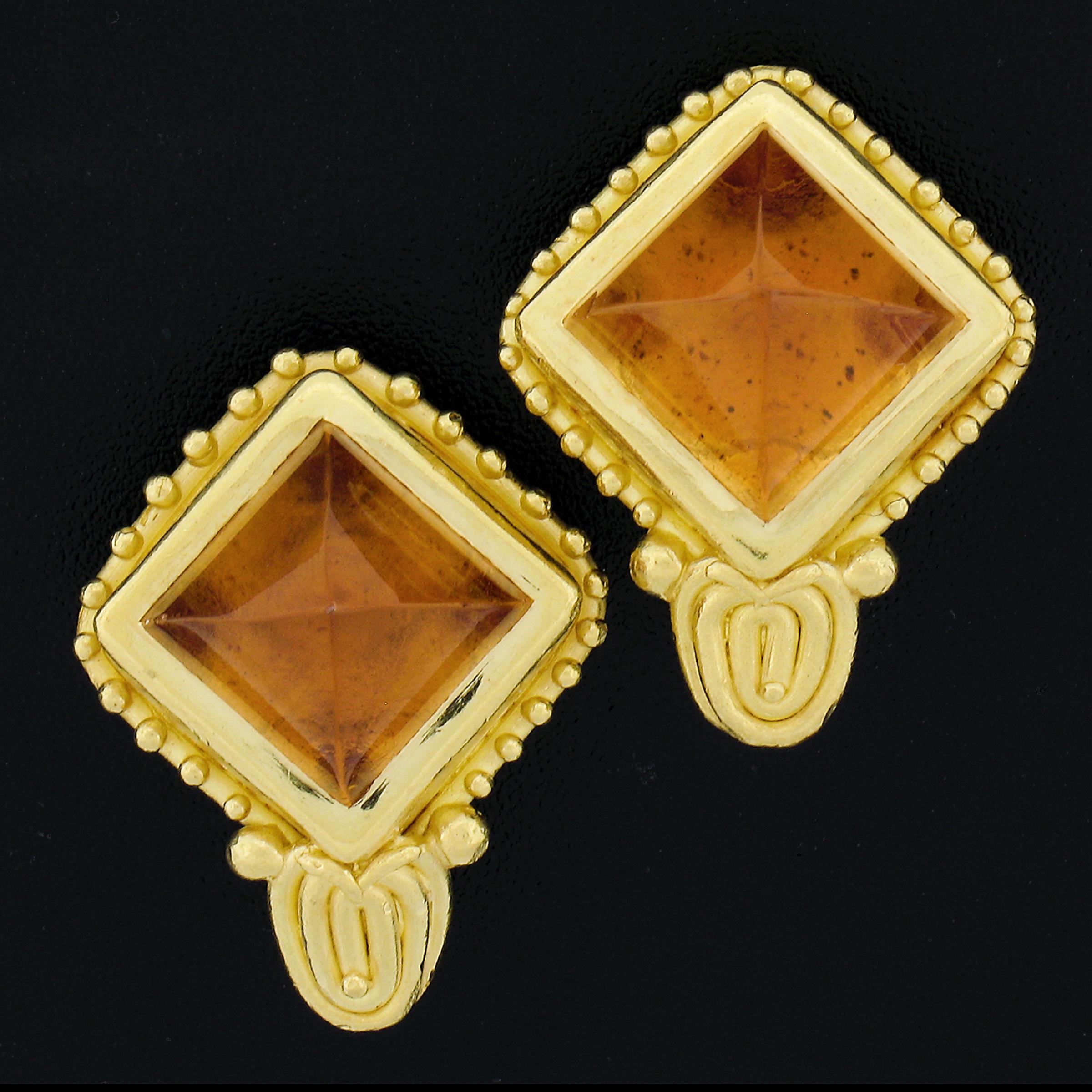 --Stone(s):--
(2) Natural Genuine Citrine - Sugarloaf Cabochon Cut - Bezel Set - Rich Orange Color - 13.4x13.4mm each (approx.)

Material: Solid 22k Yellow Gold Earrings w/ 14K Yellow Gold Backings
Weight: 18.58 Grams
Backing:	Clip On Omega Closures