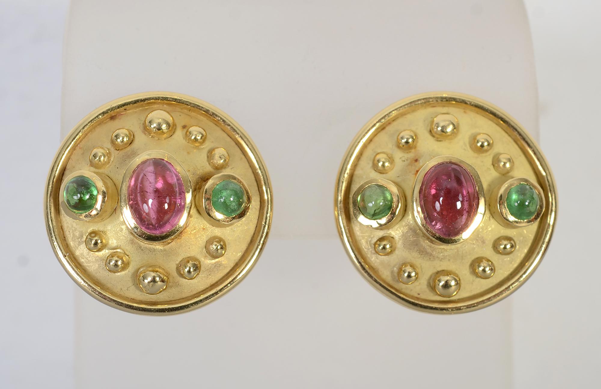 Denise Roberge round 18 karat gold earrings with beautifully colored pink and green tourmalines. The central oval stone is approximately .5 carats and the round green stones are approximately .25 carats each. Gold beading goes around the perimeter