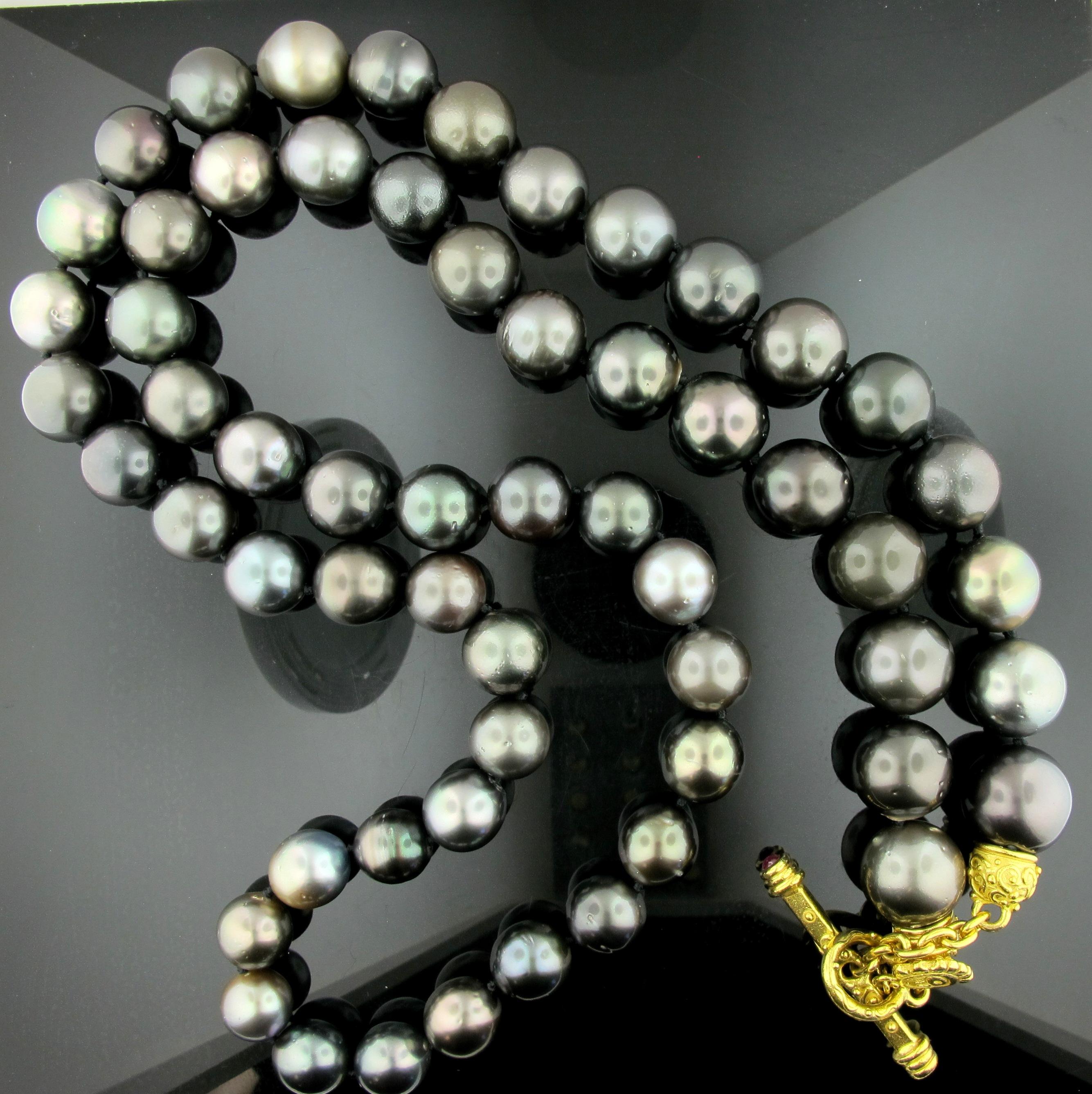 Signed Denise Roberge Pearl Necklace. 58 Tahitian Pearls with a signature 22 karat yellow gold toggle clasp.  Pearls are 11mm - 16mm.  Length is 17